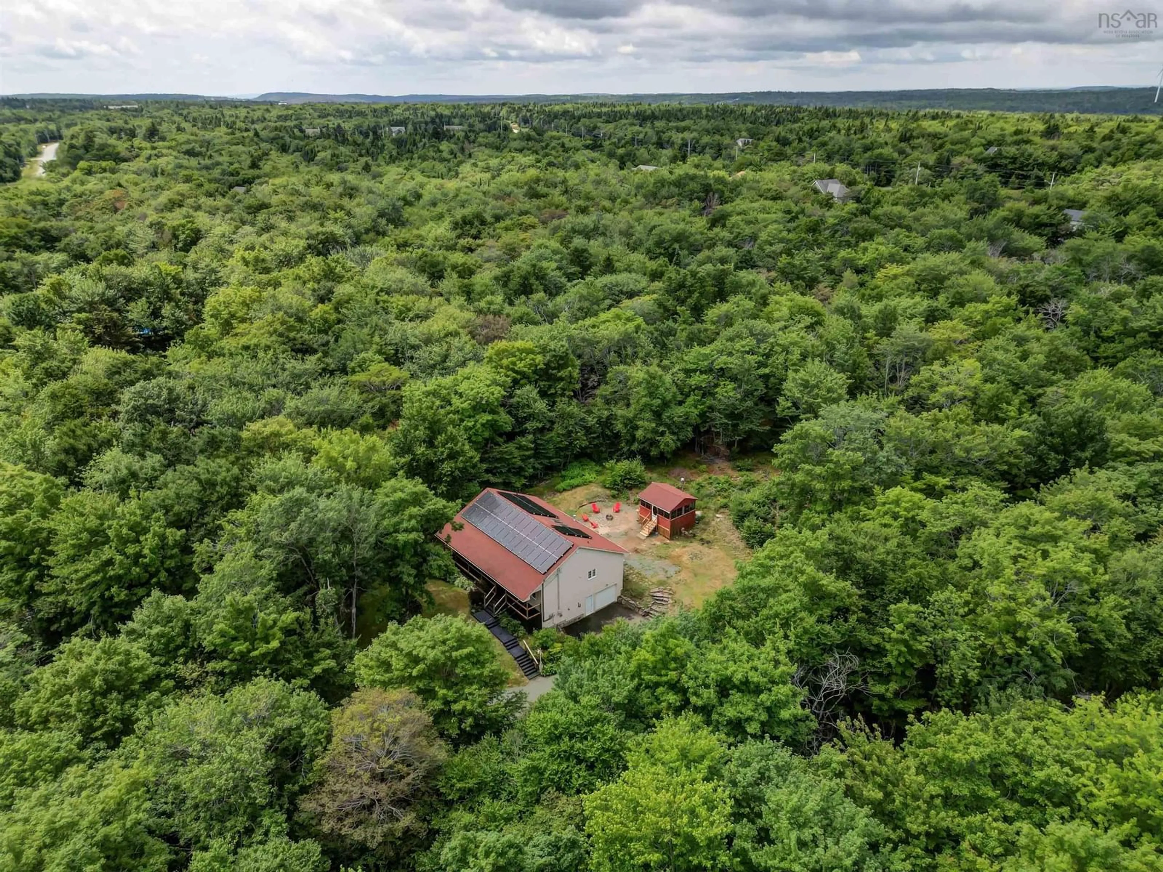 A pic from outside/outdoor area/front of a property/back of a property/a pic from drone, forest/trees view for 138 Tattenham Cres, Hammonds Plains Nova Scotia B4B 1V2