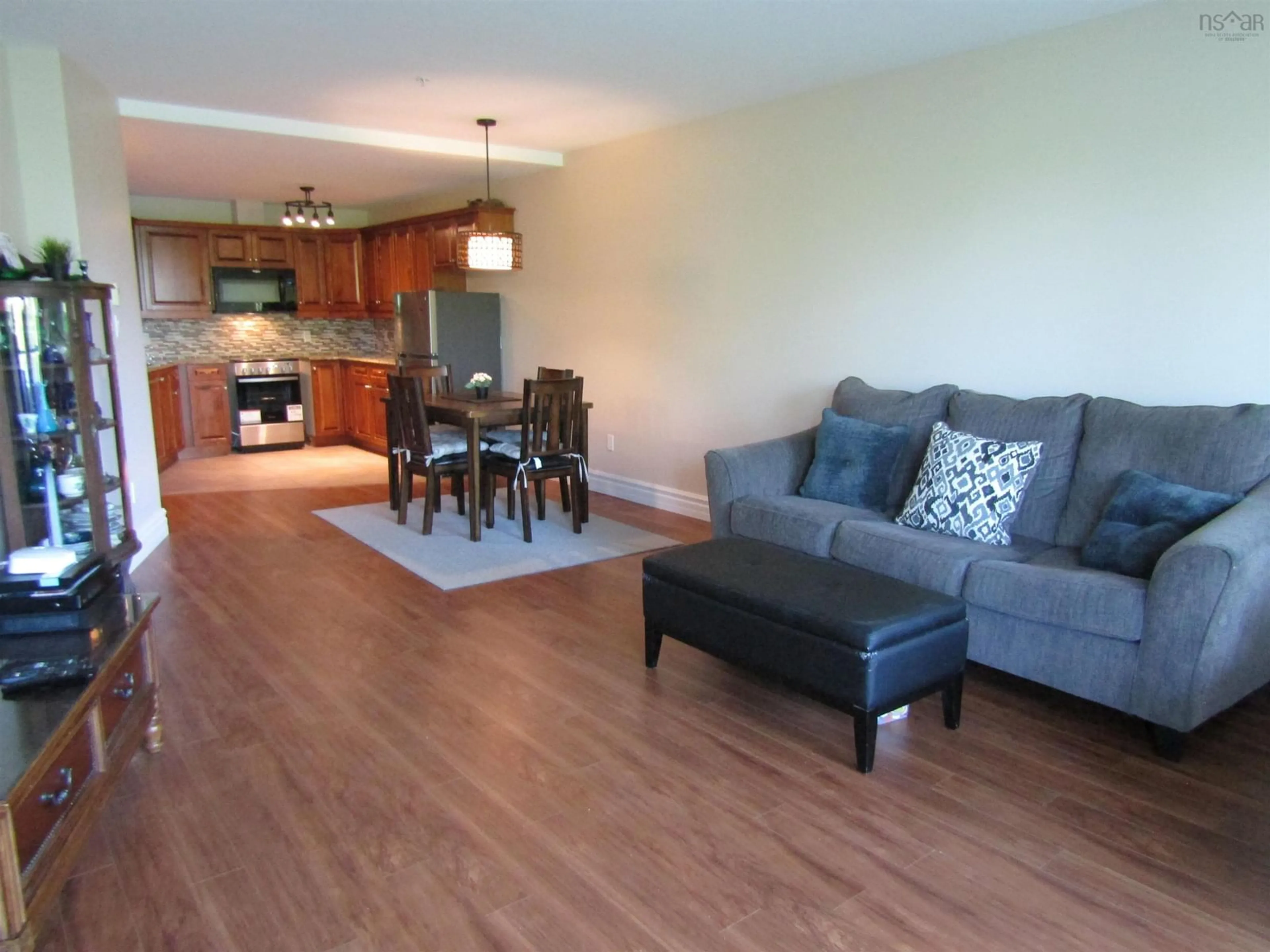 Living room with furniture, wood/laminate floor for 87 Pebblecreek Cres, Dartmouth Nova Scotia B2W 0J9