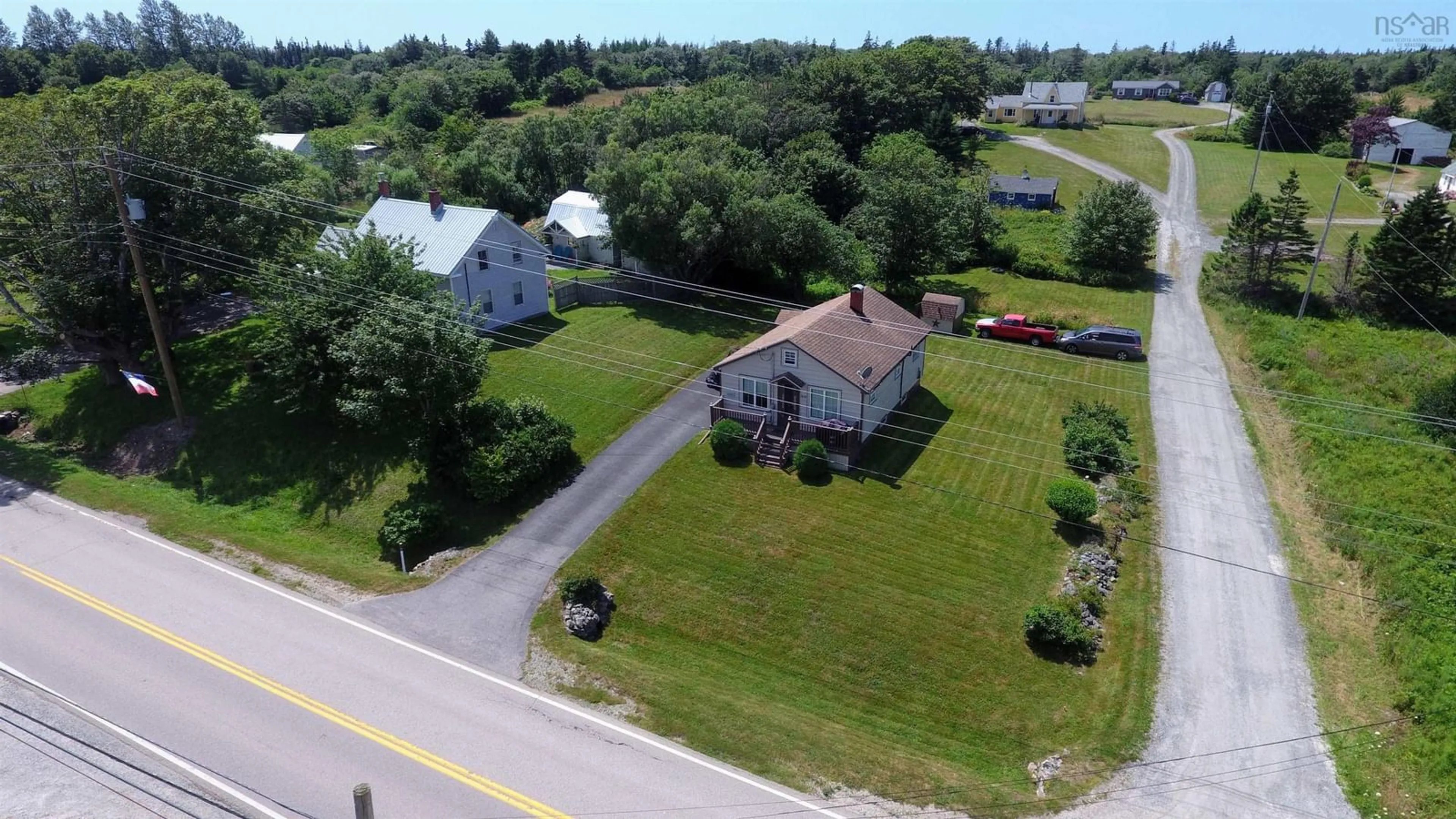A pic from outside/outdoor area/front of a property/back of a property/a pic from drone, street for 504 Highway 335,, West Pubnico Nova Scotia B0W 3S0