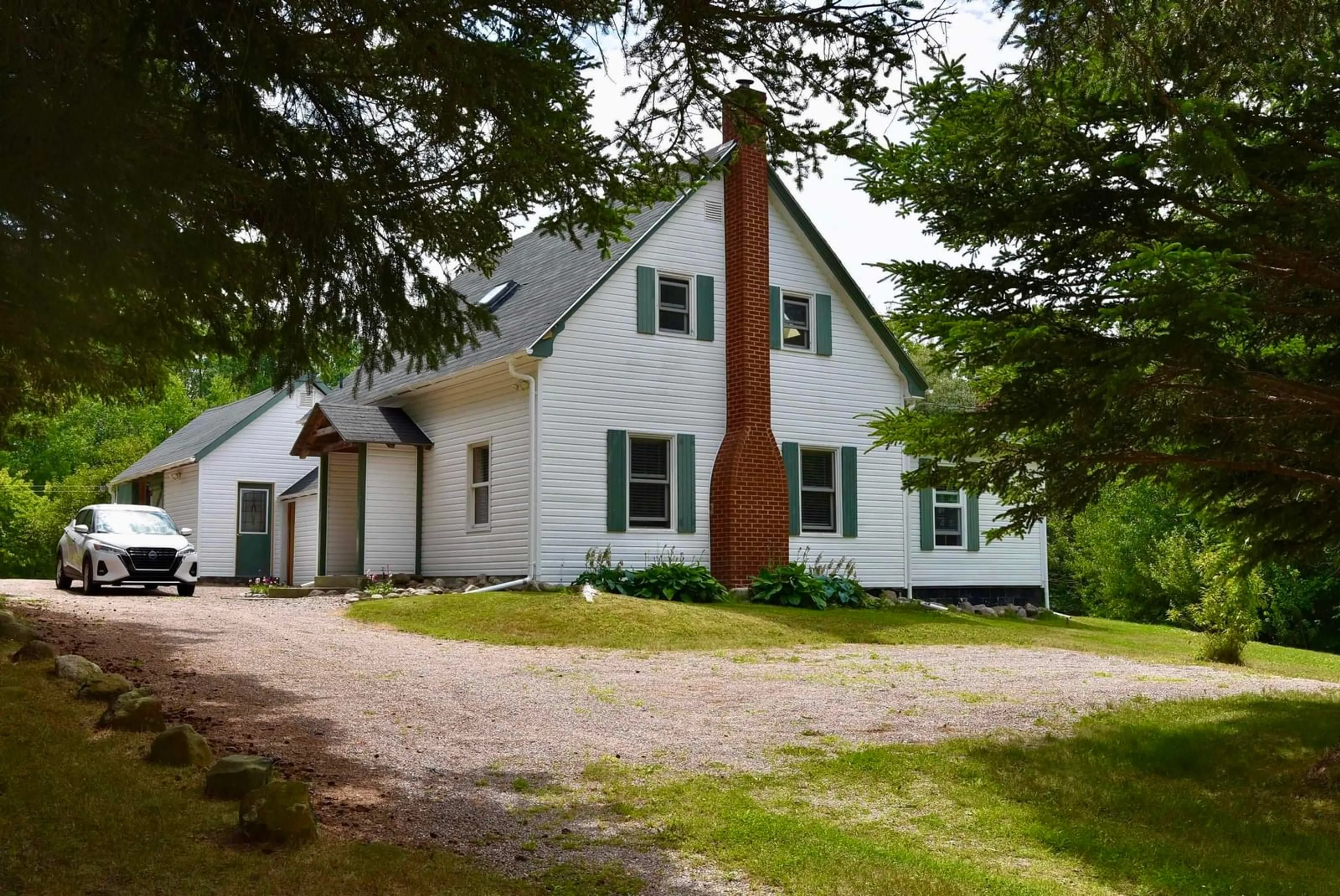 A pic from outside/outdoor area/front of a property/back of a property/a pic from drone, street for 8012 Shore Rd, Hampton Nova Scotia B0S 1L0