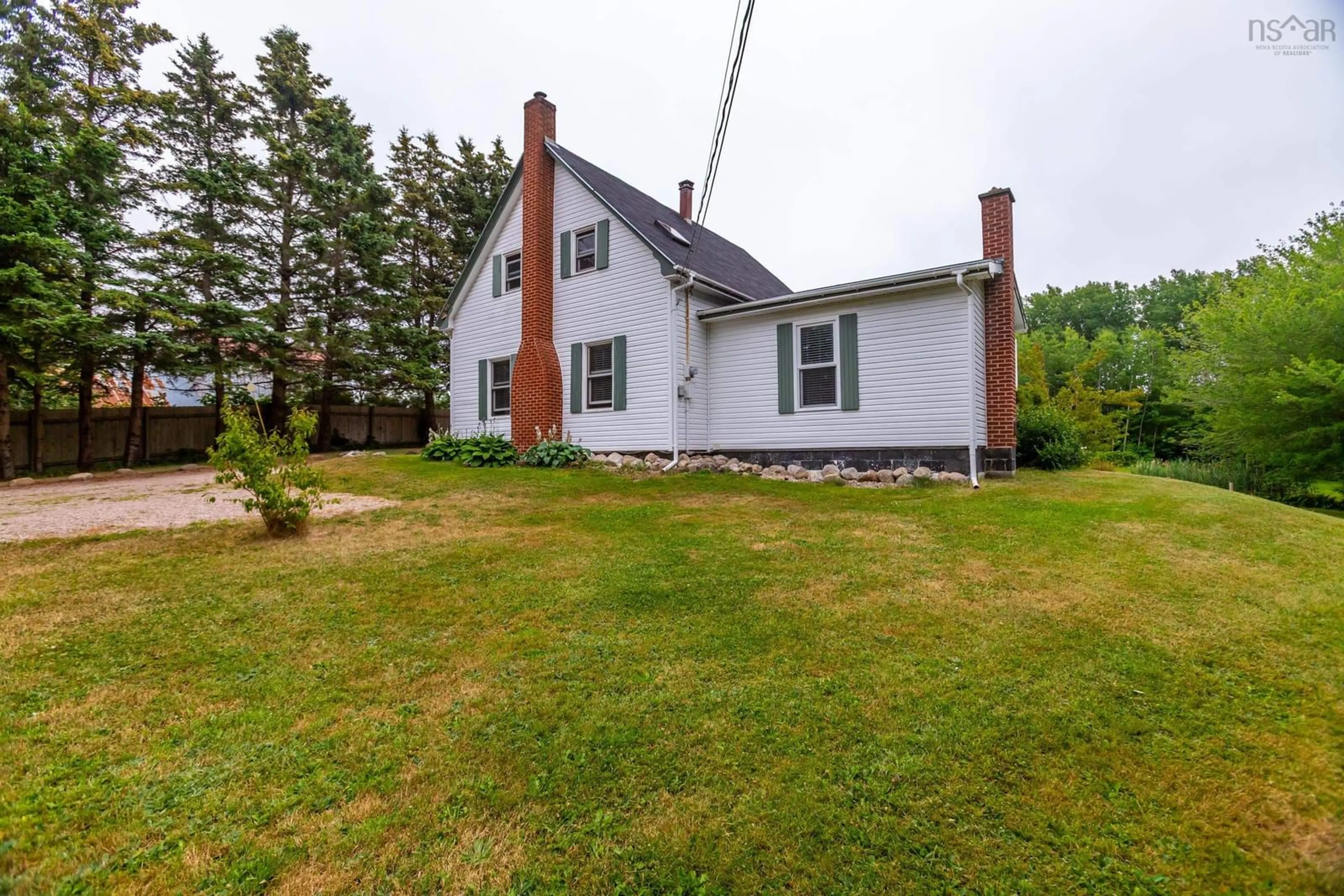 A pic from outside/outdoor area/front of a property/back of a property/a pic from drone, building for 8012 Shore Rd, Hampton Nova Scotia B0S 1L0