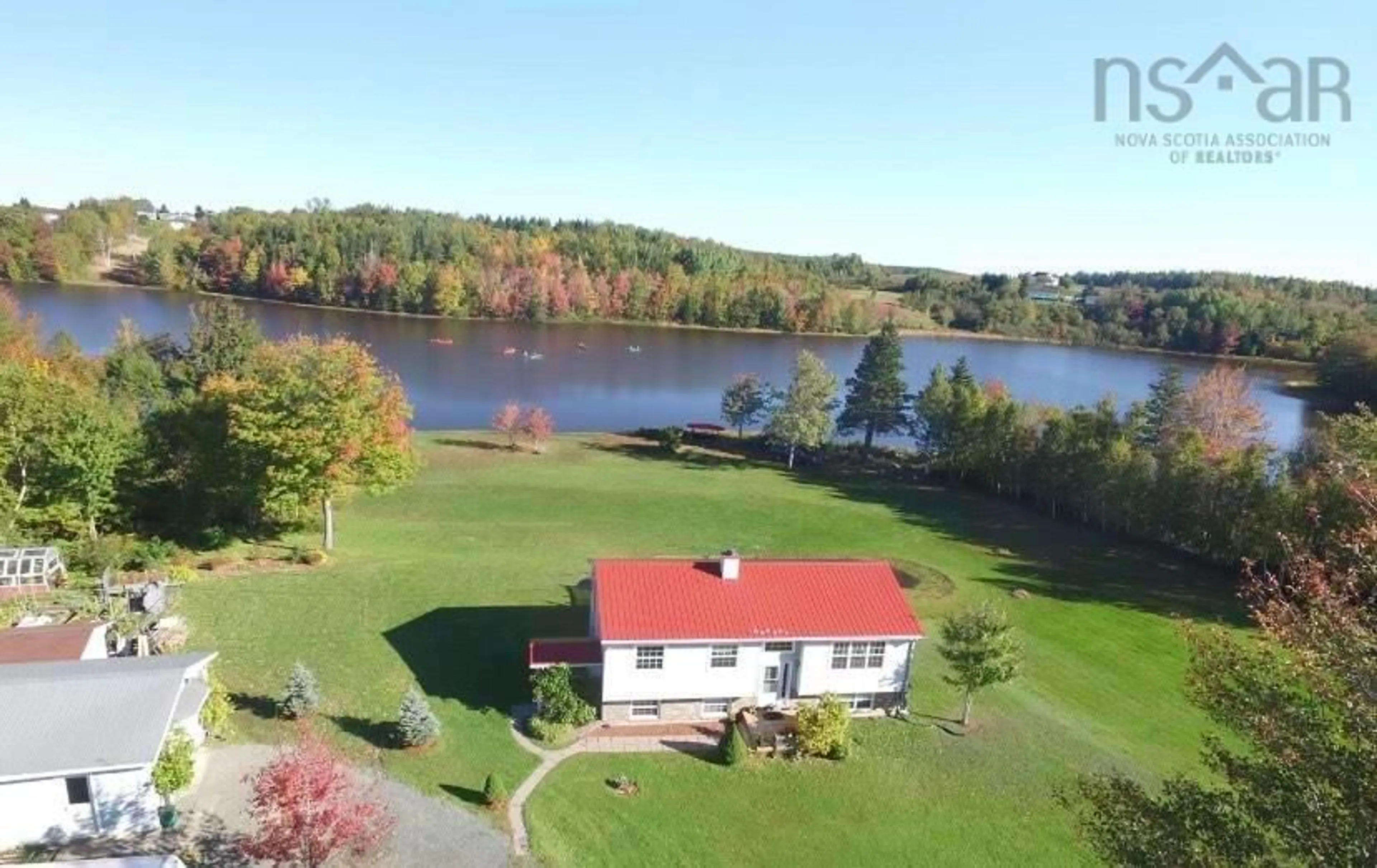 A pic from outside/outdoor area/front of a property/back of a property/a pic from drone, water/lake/river/ocean view for 233 Pomquet Lake Road, Pomquet Nova Scotia B2G 2L4