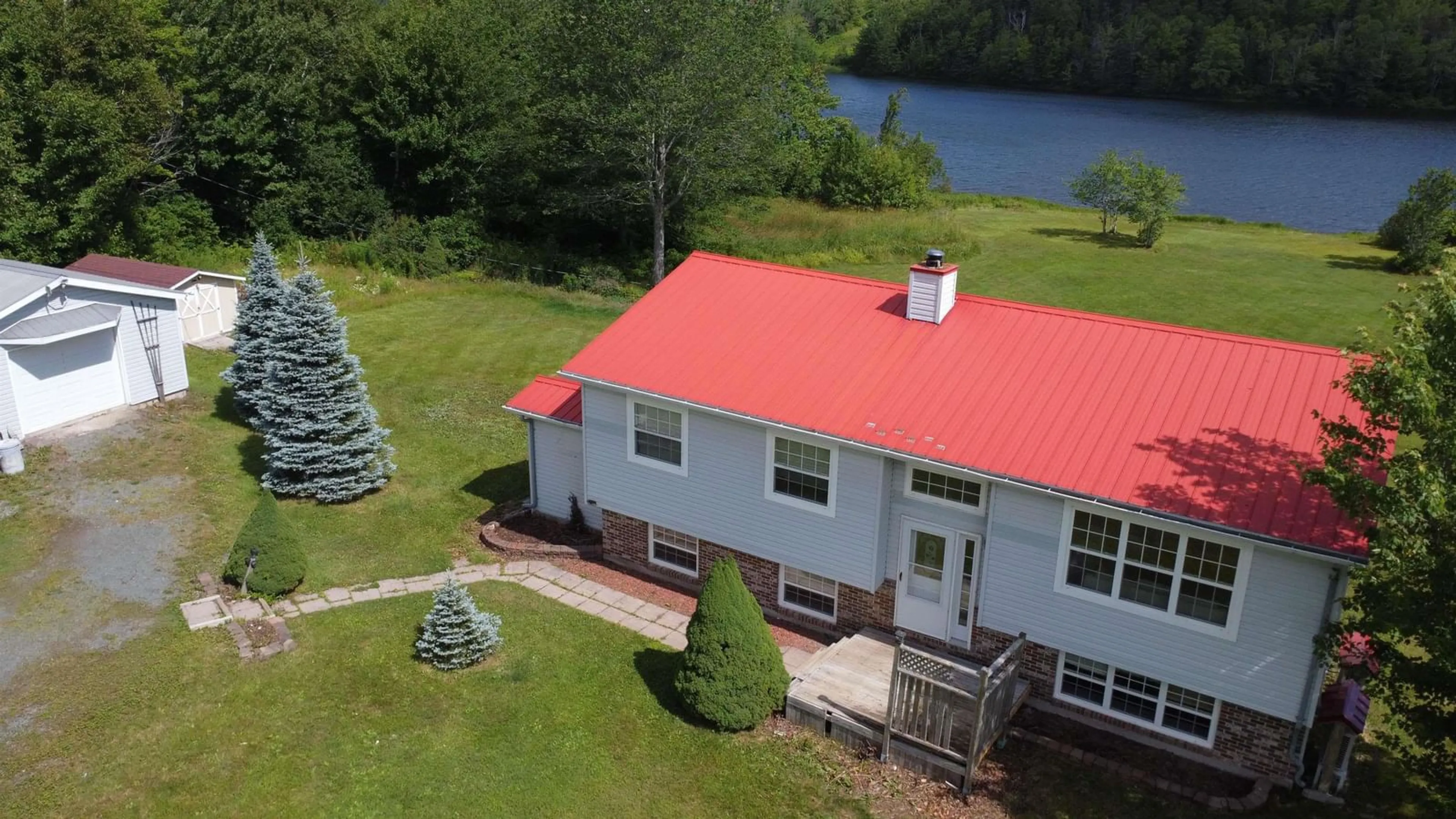 A pic from outside/outdoor area/front of a property/back of a property/a pic from drone, water/lake/river/ocean view for 233 Pomquet Lake Road, Pomquet Nova Scotia B2G 2L4