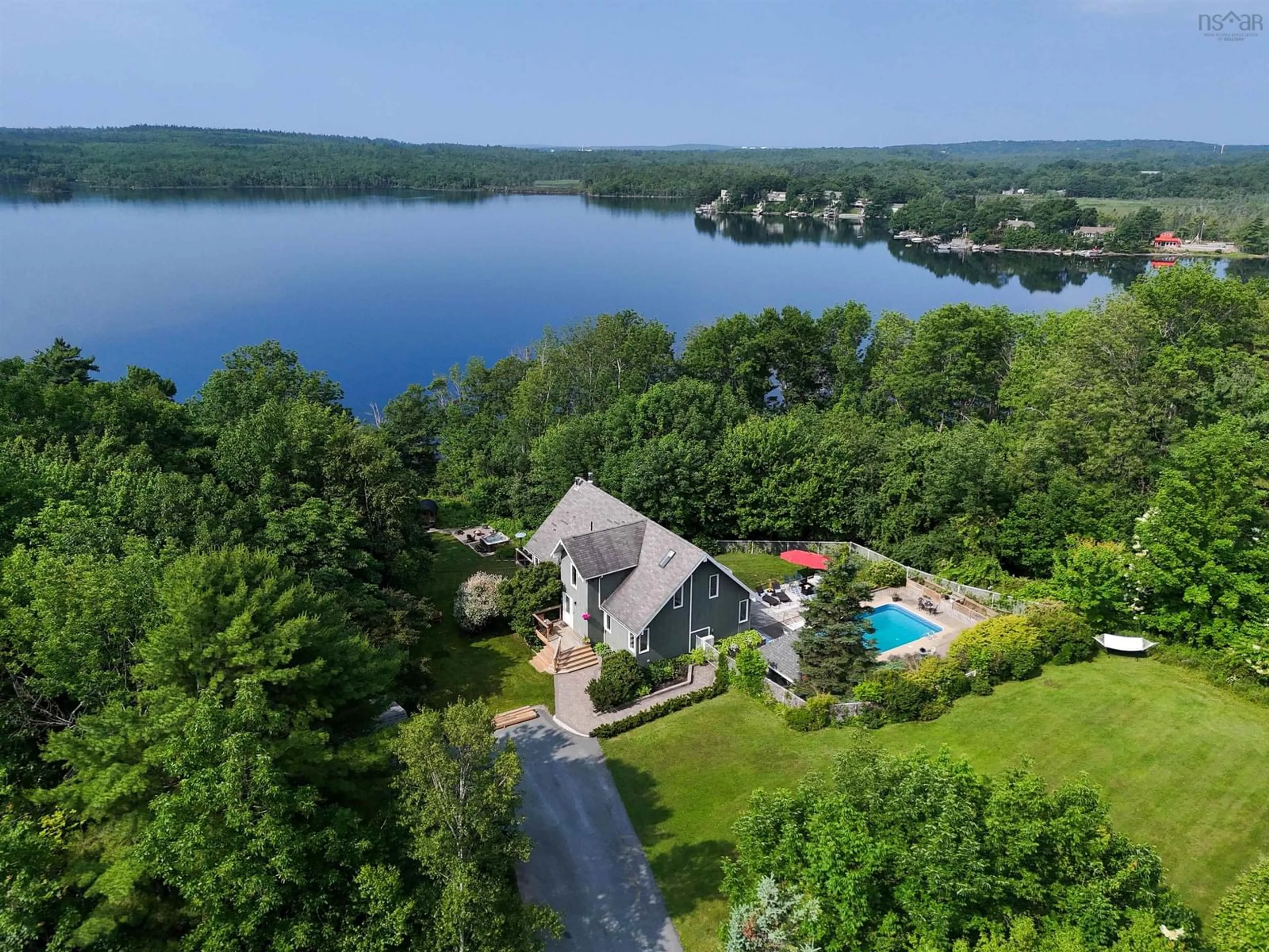 A pic from outside/outdoor area/front of a property/back of a property/a pic from drone, water/lake/river/ocean view for 52 Stone Hedges Lane, Waverley Nova Scotia B2R 1H2