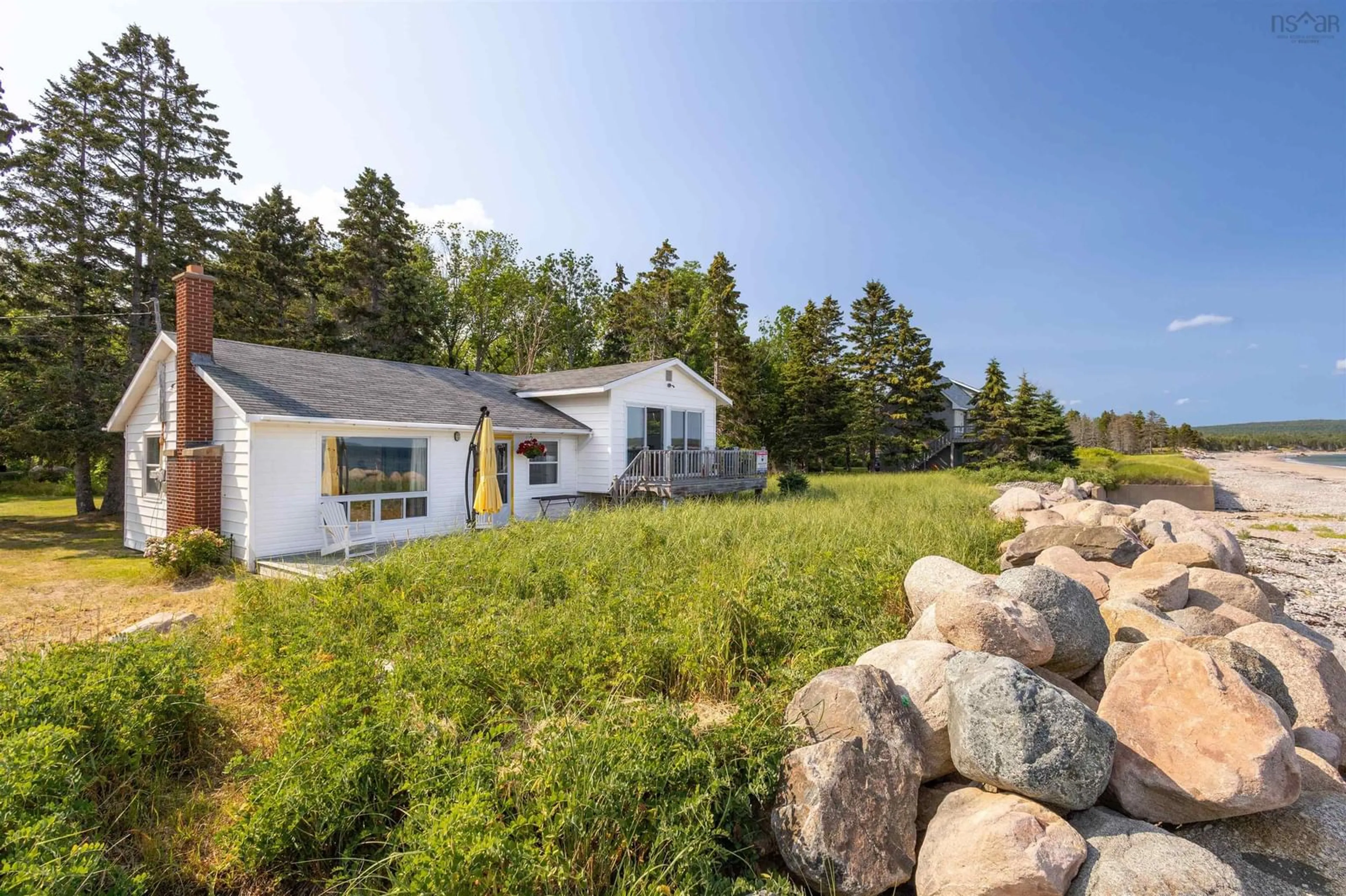 A pic from outside/outdoor area/front of a property/back of a property/a pic from drone, unknown for 18 Wild Rose Lane, Ingonish Nova Scotia B0C 1L0