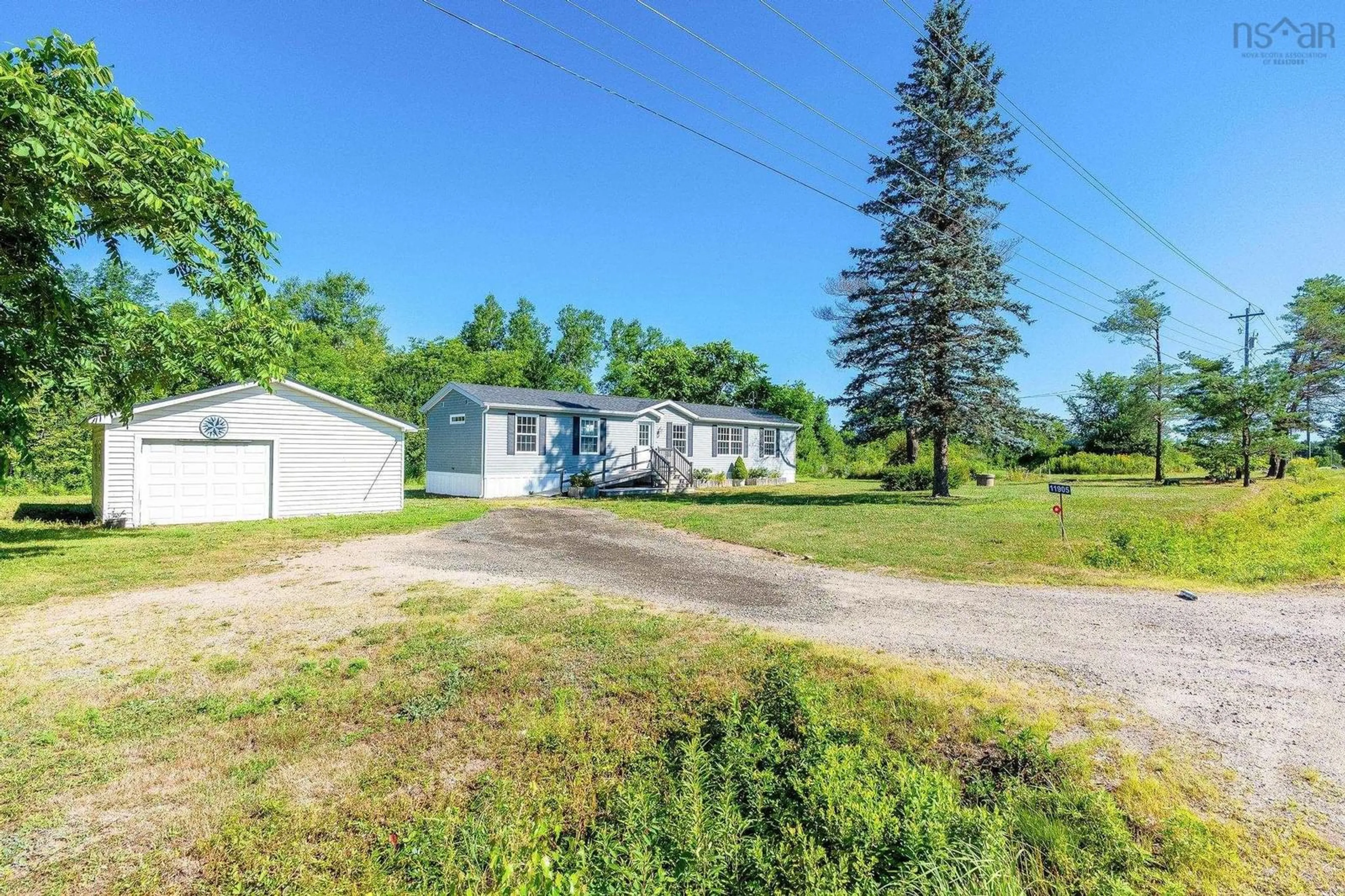 A pic from outside/outdoor area/front of a property/back of a property/a pic from drone, unknown for 11905 Highway 1, Brickton Nova Scotia B0S 1M0