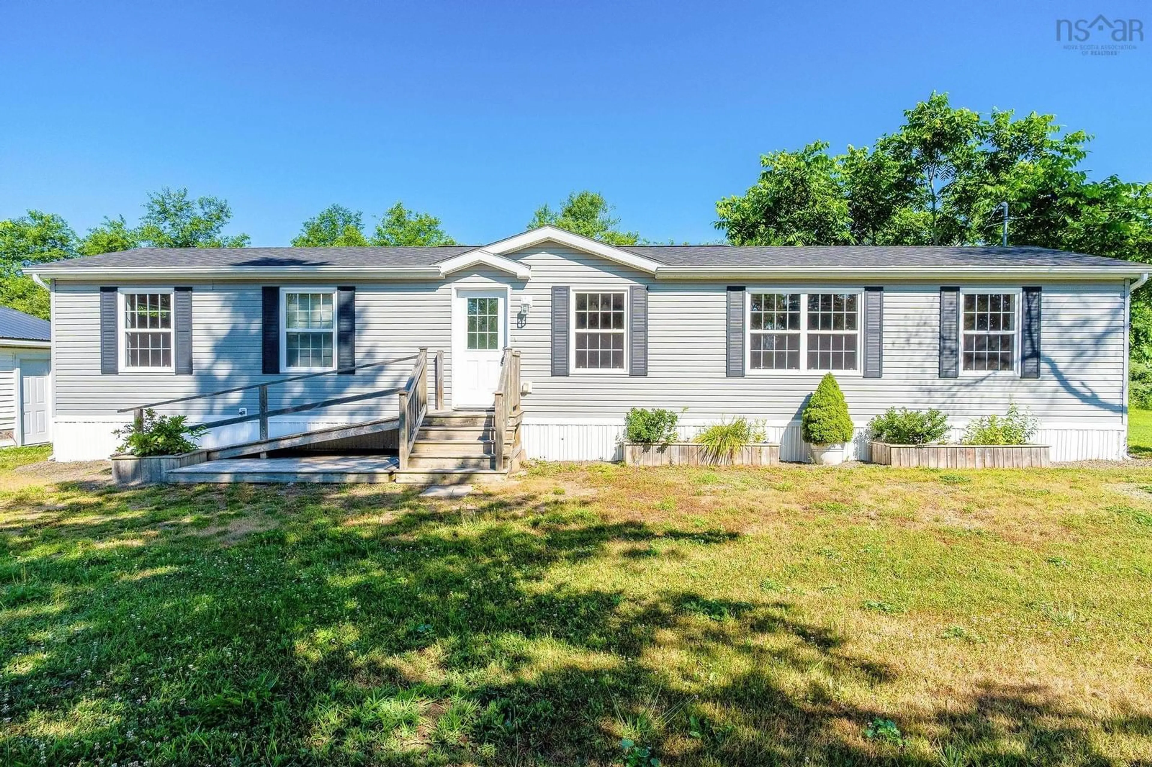 Home with vinyl exterior material, street for 11905 Highway 1, Brickton Nova Scotia B0S 1M0