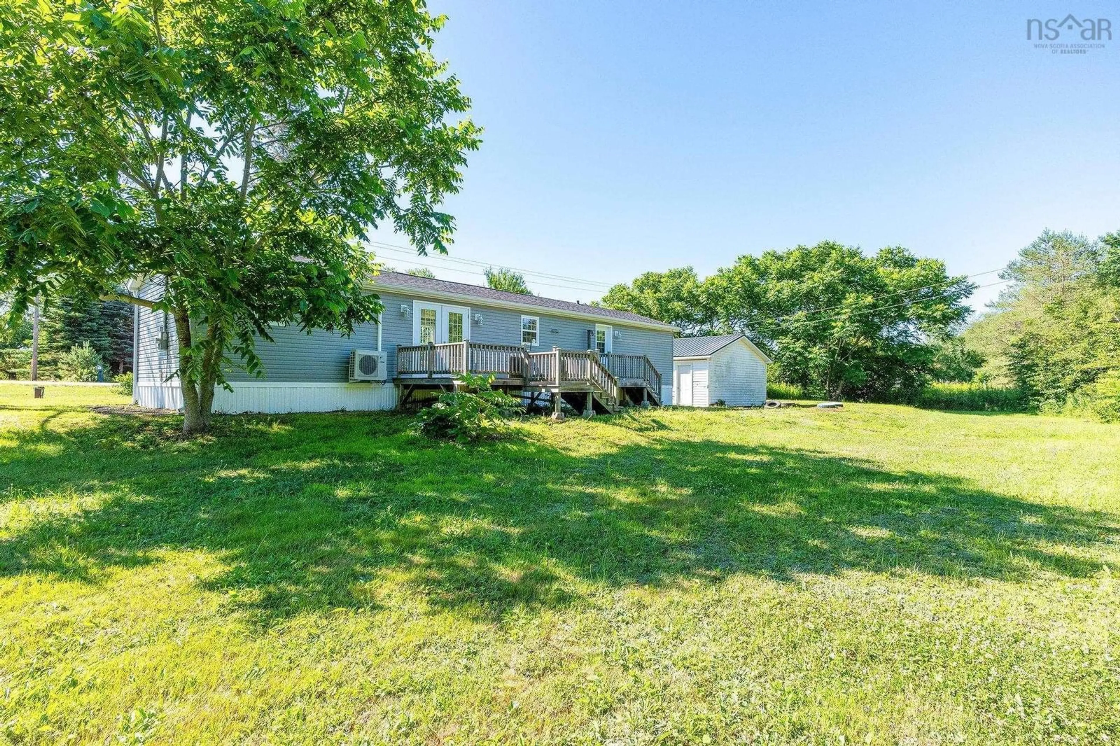 A pic from outside/outdoor area/front of a property/back of a property/a pic from drone, water/lake/river/ocean view for 11905 Highway 1, Brickton Nova Scotia B0S 1M0