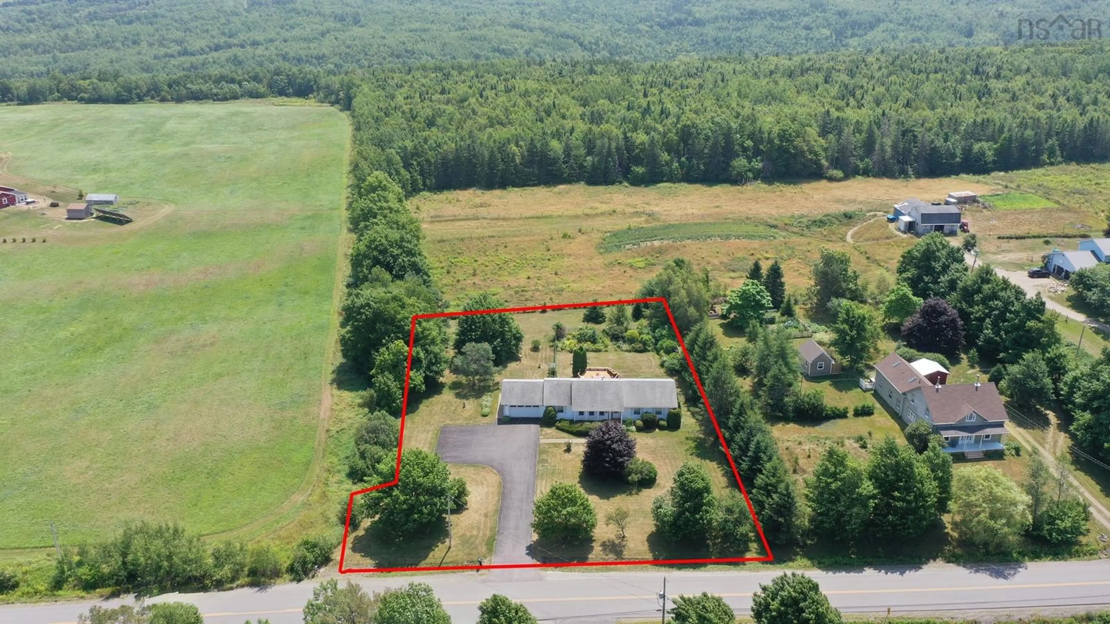 A pic from outside/outdoor area/front of a property/back of a property/a pic from drone, building for 4040 Prospect Rd, North Alton Nova Scotia B4N 3V8