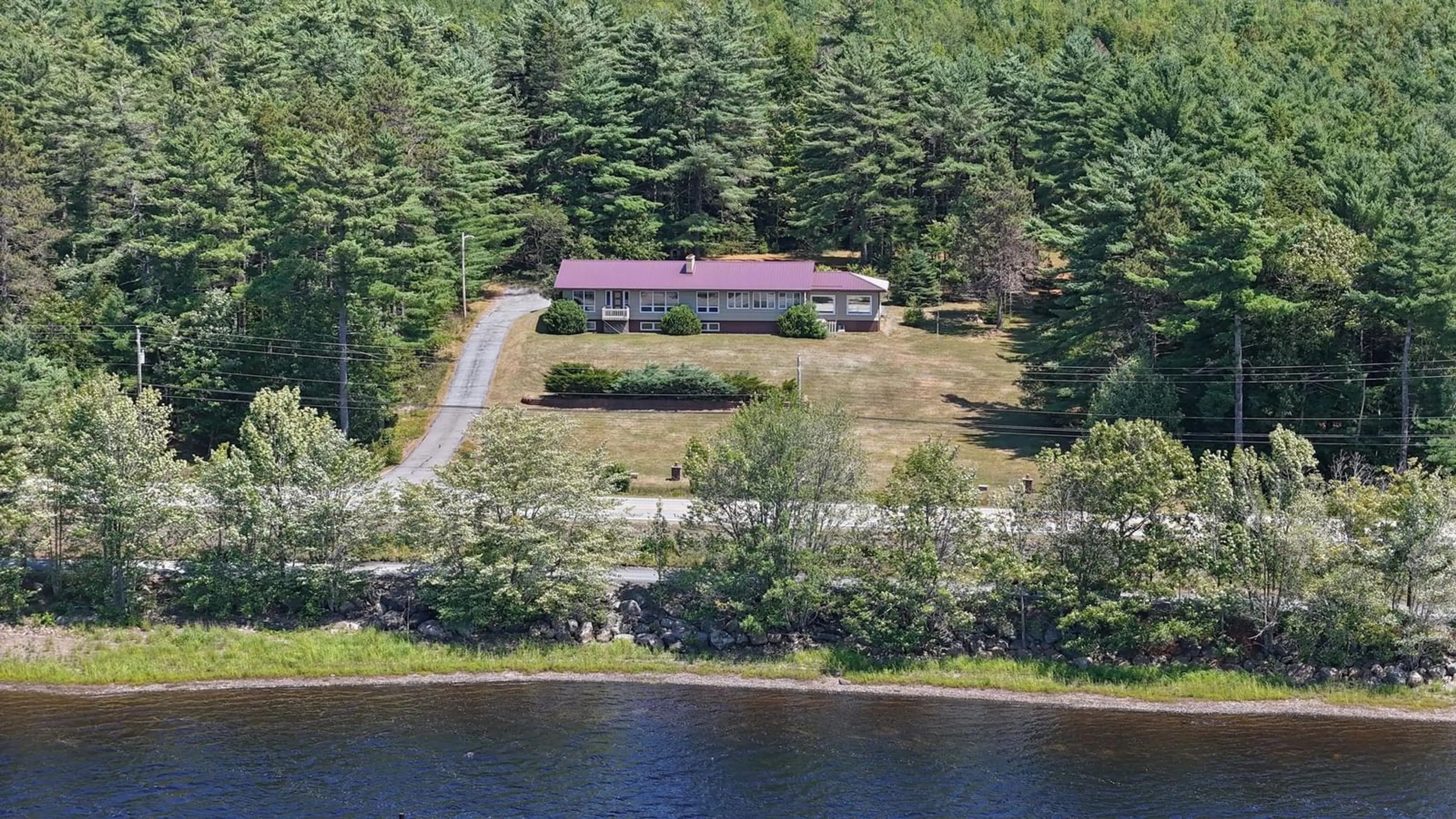 A pic from outside/outdoor area/front of a property/back of a property/a pic from drone, water/lake/river/ocean view for 2750 Highway 10, Wentzells Lake Nova Scotia B0R 1E0