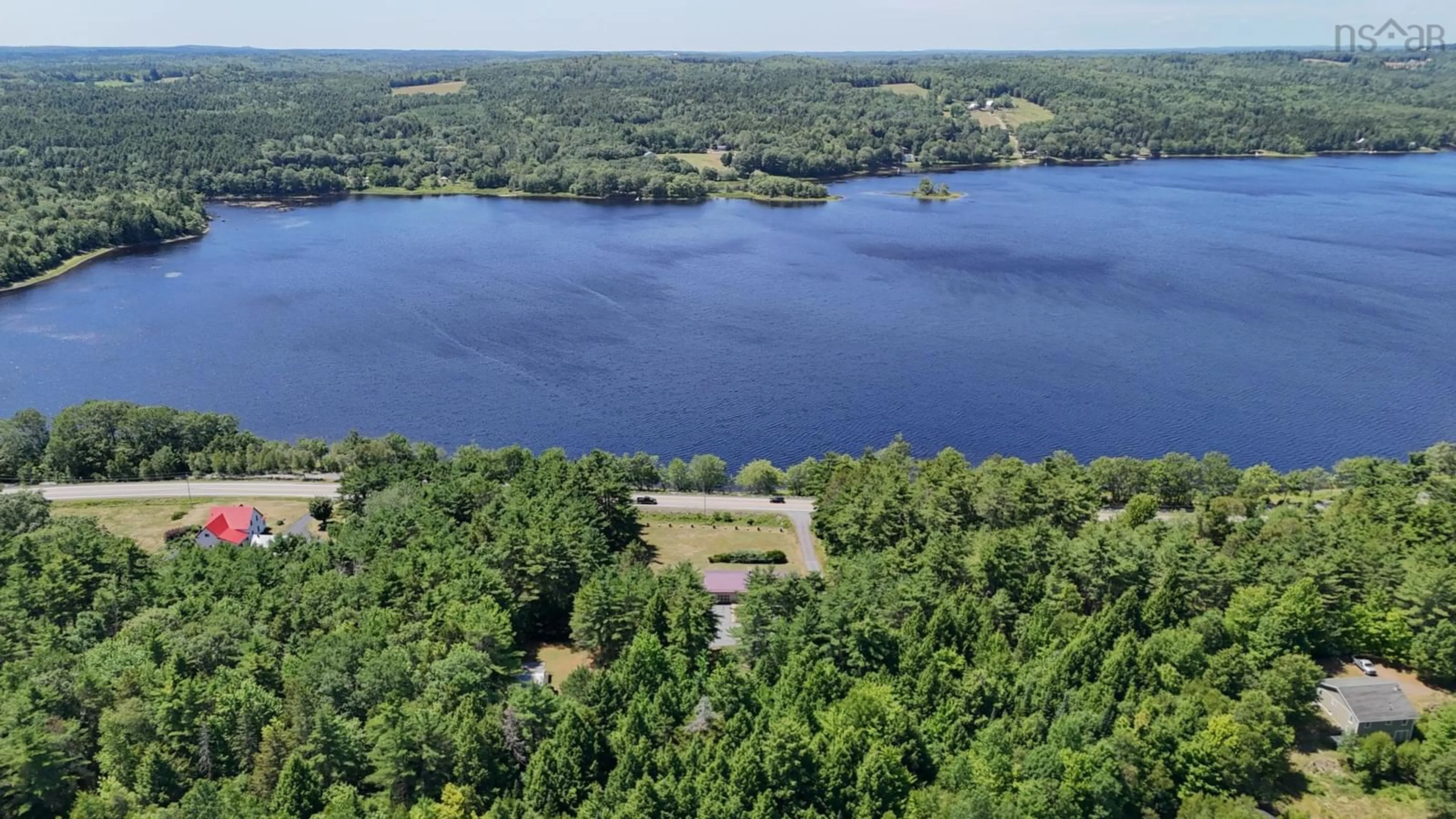 A pic from outside/outdoor area/front of a property/back of a property/a pic from drone, water/lake/river/ocean view for 2750 Highway 10, Wentzells Lake Nova Scotia B0R 1E0
