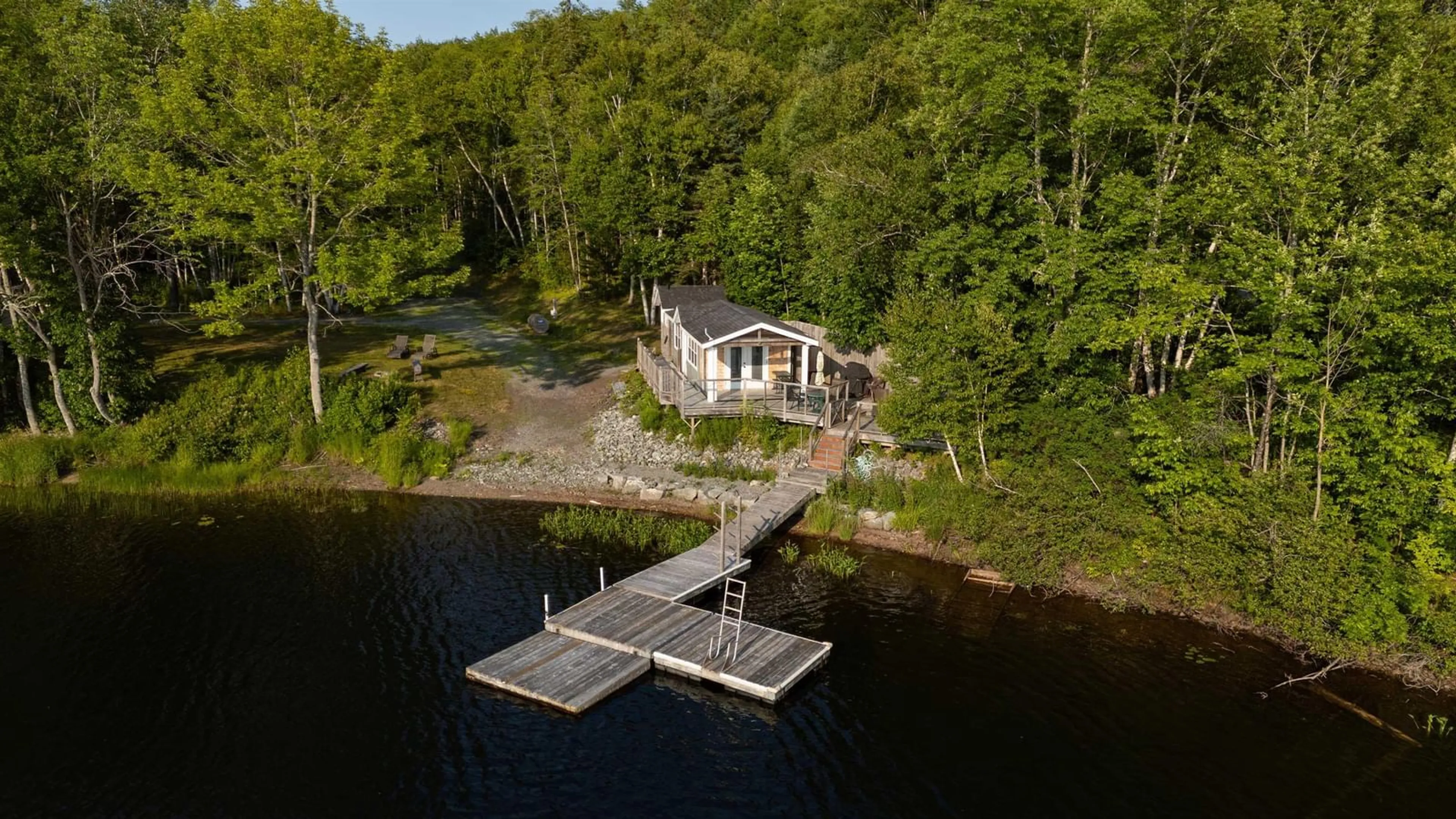 A pic from outside/outdoor area/front of a property/back of a property/a pic from drone, water/lake/river/ocean view for 1207 Highway 7 Lochaber, Lochaber Nova Scotia B2G 2L3