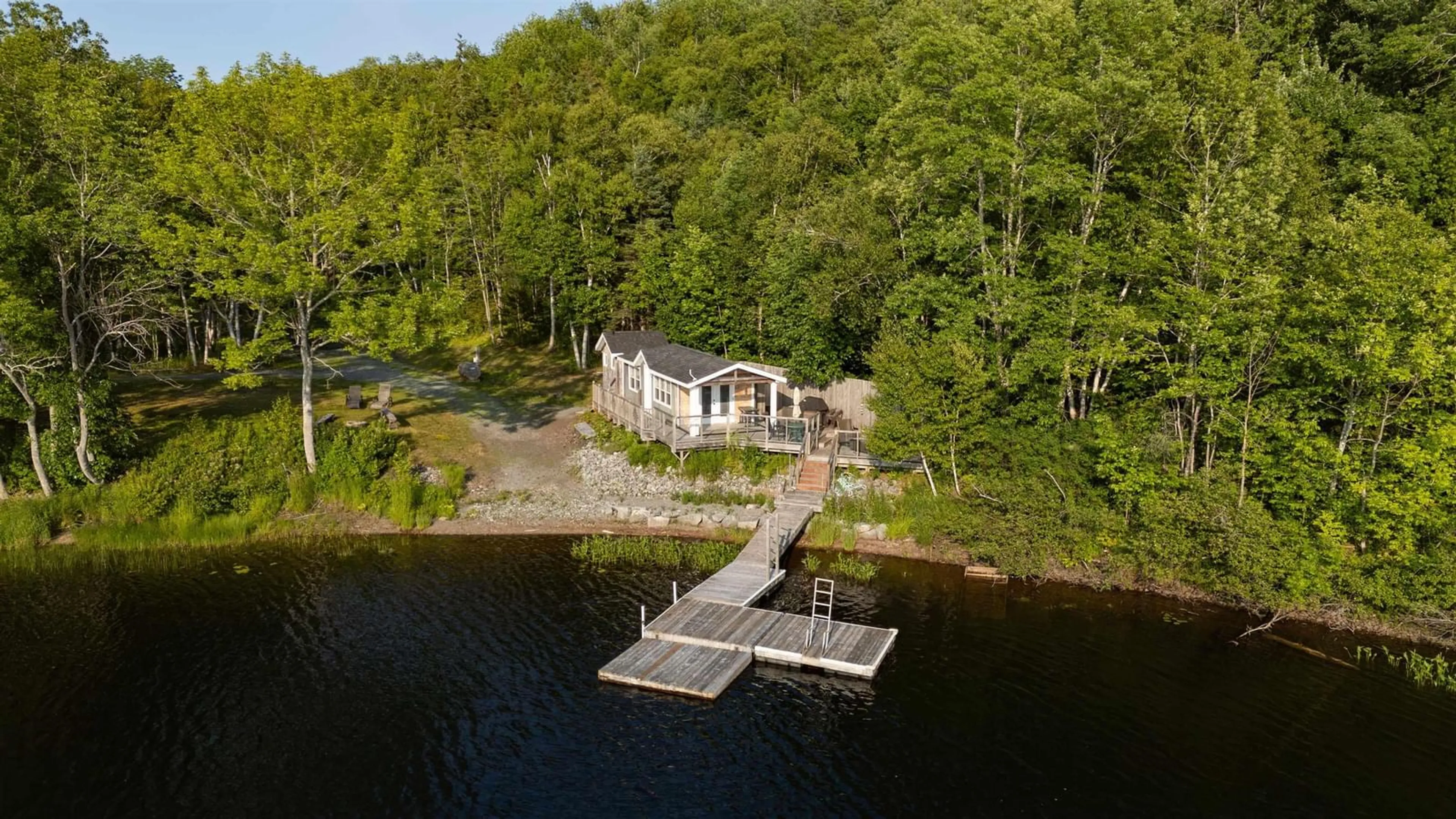 A pic from outside/outdoor area/front of a property/back of a property/a pic from drone, water/lake/river/ocean view for 1207 Highway 7 Lochaber, Lochaber Nova Scotia B2G 2L3