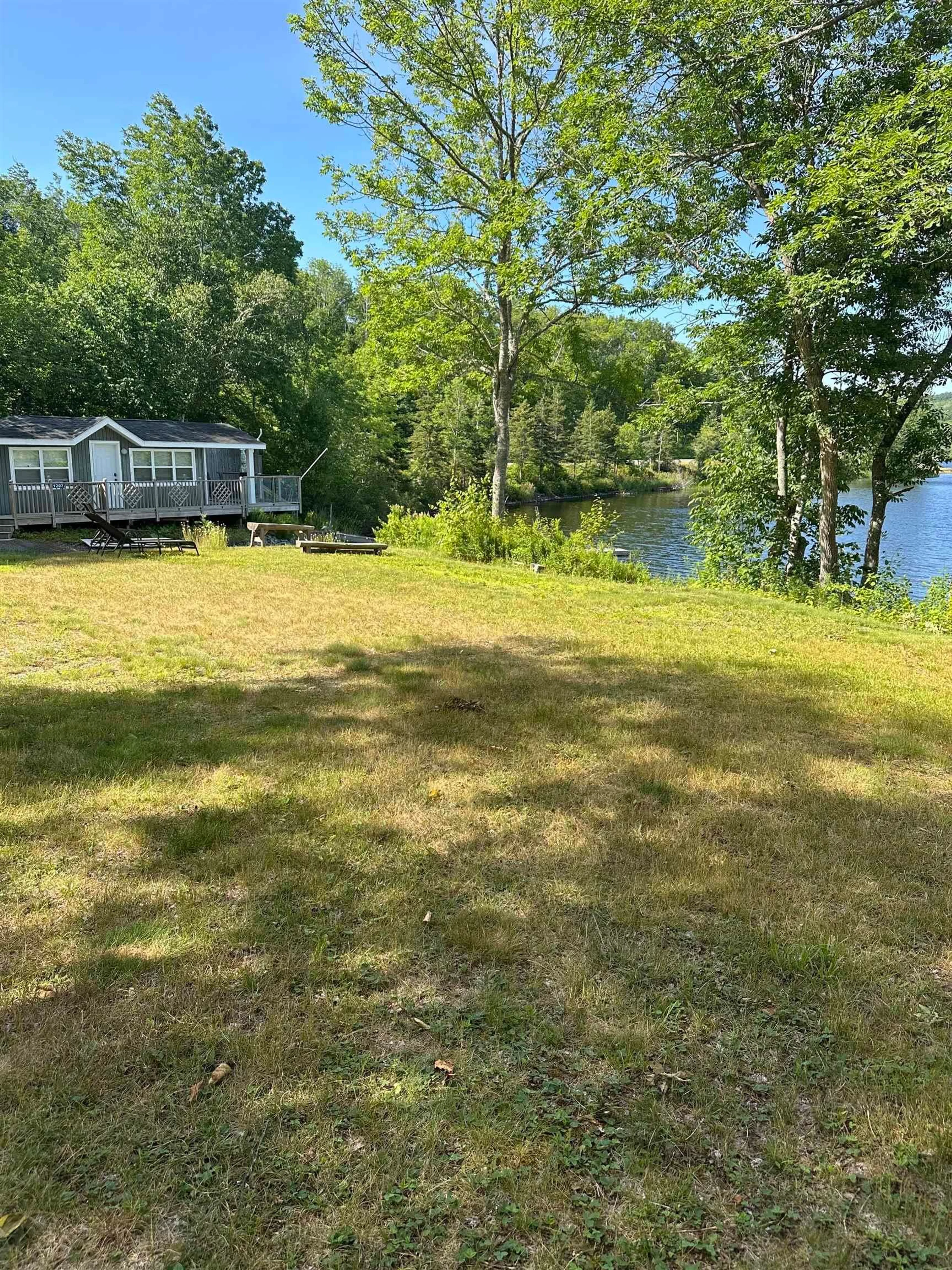 A pic from outside/outdoor area/front of a property/back of a property/a pic from drone, water/lake/river/ocean view for 1207 Highway 7 Lochaber, Lochaber Nova Scotia B2G 2L3
