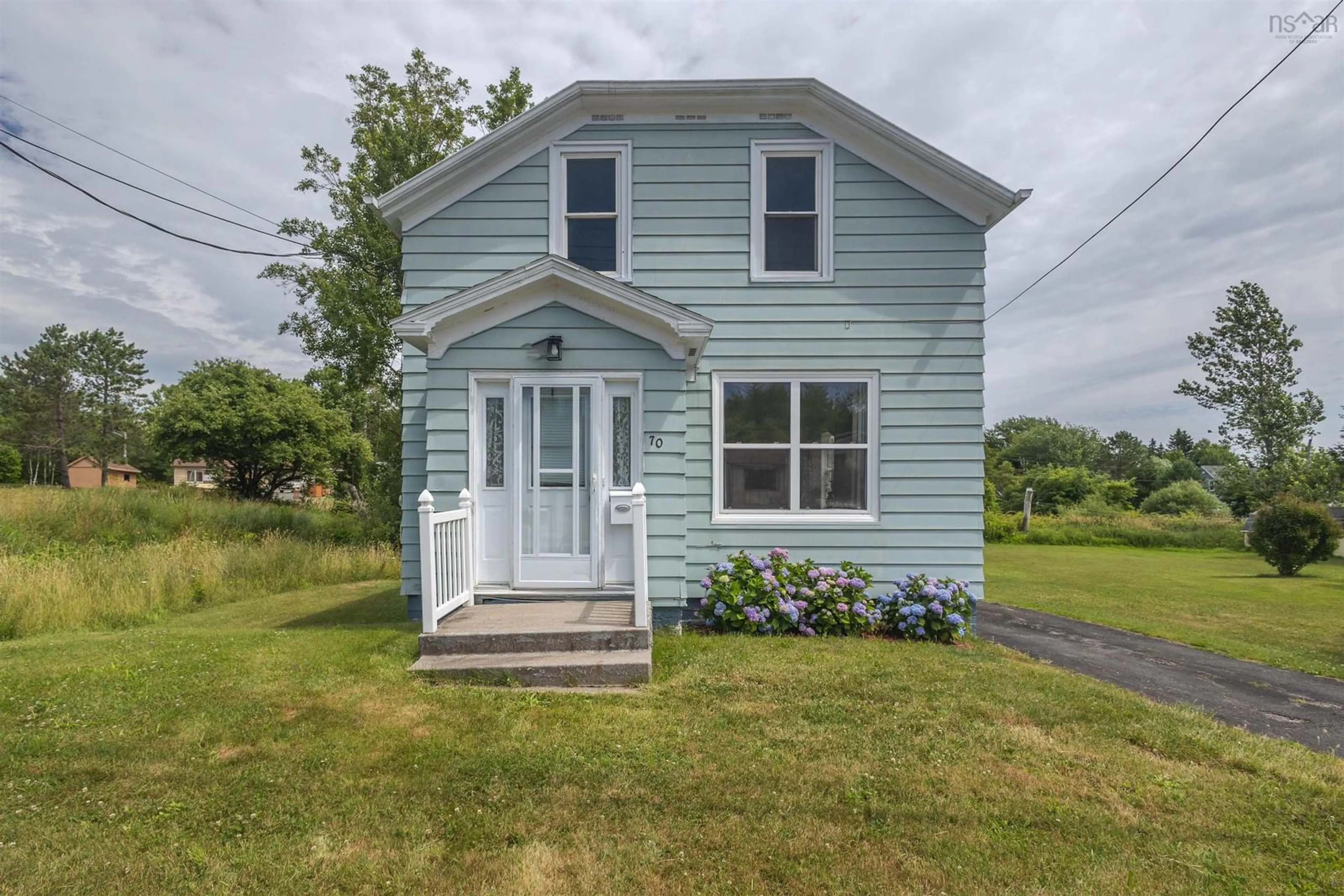Home with vinyl exterior material, street for 70 Murphy Rd, Westmount Nova Scotia B1R 1W5