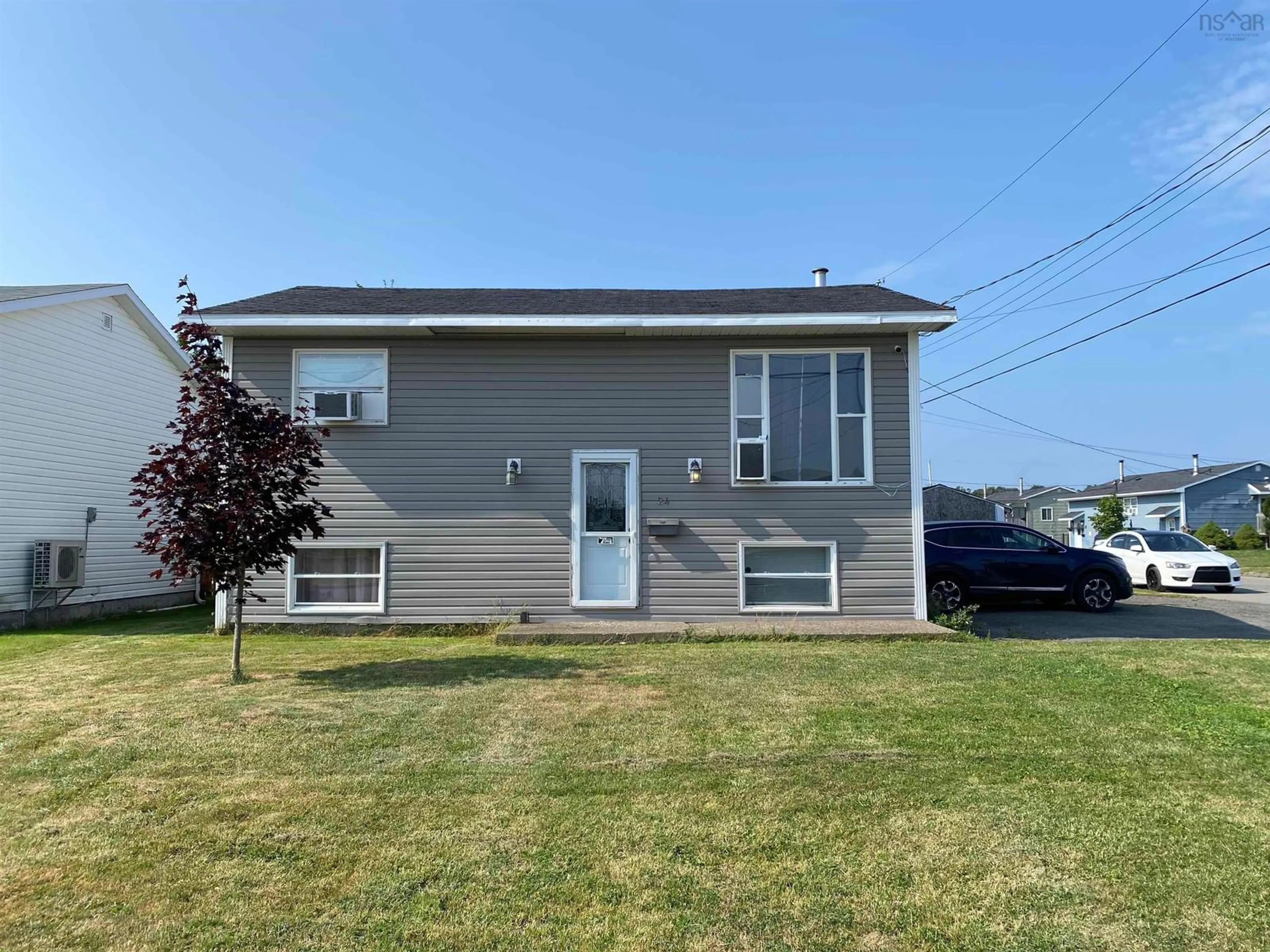 Home with vinyl exterior material, unknown for 24 Notre Dame St, Sydney Mines Nova Scotia B1V 2R7