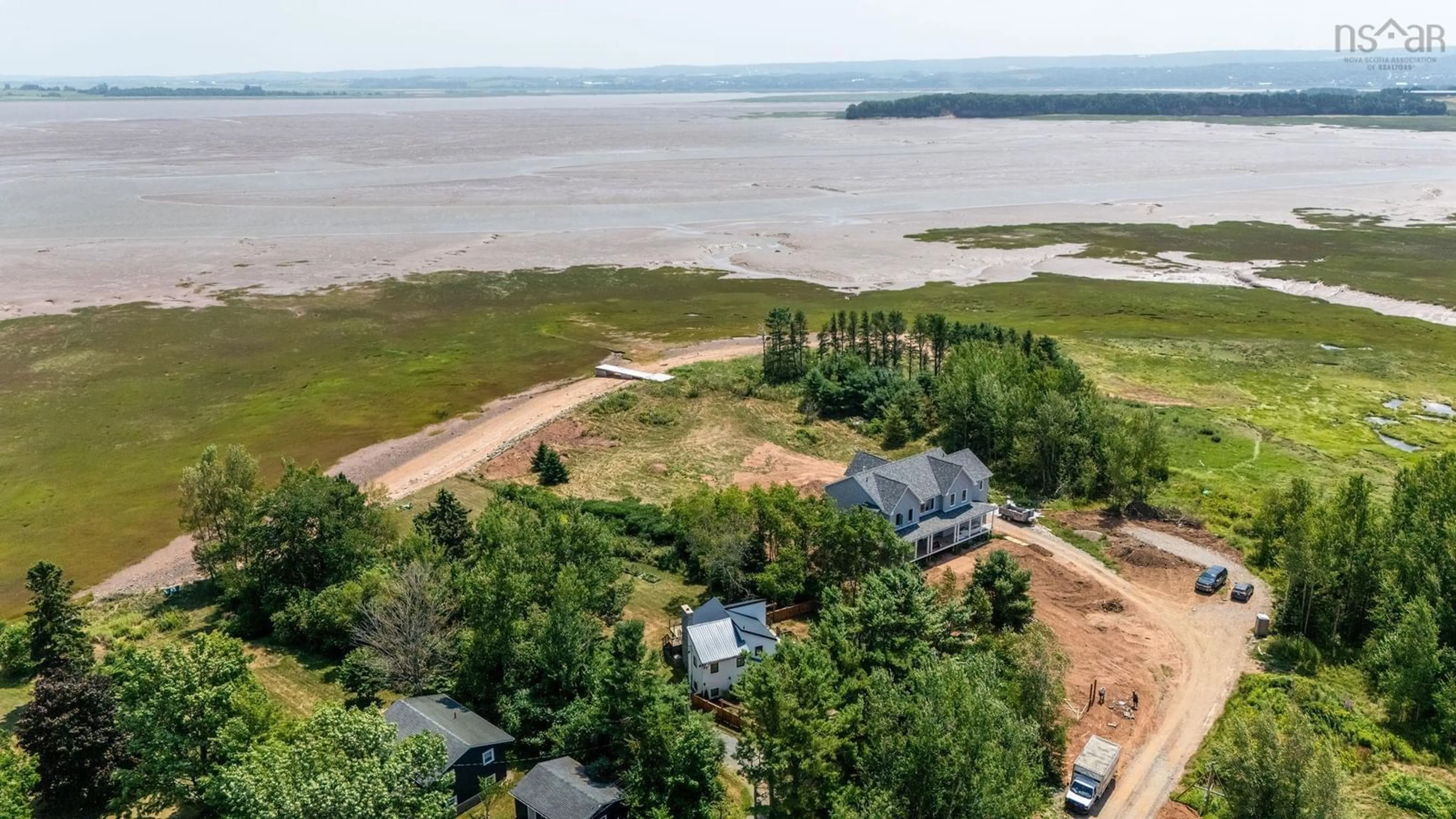 A pic from outside/outdoor area/front of a property/back of a property/a pic from drone, water/lake/river/ocean view for 504 Porters Point Branch Rd, Lower Canard Nova Scotia B0P 1T0