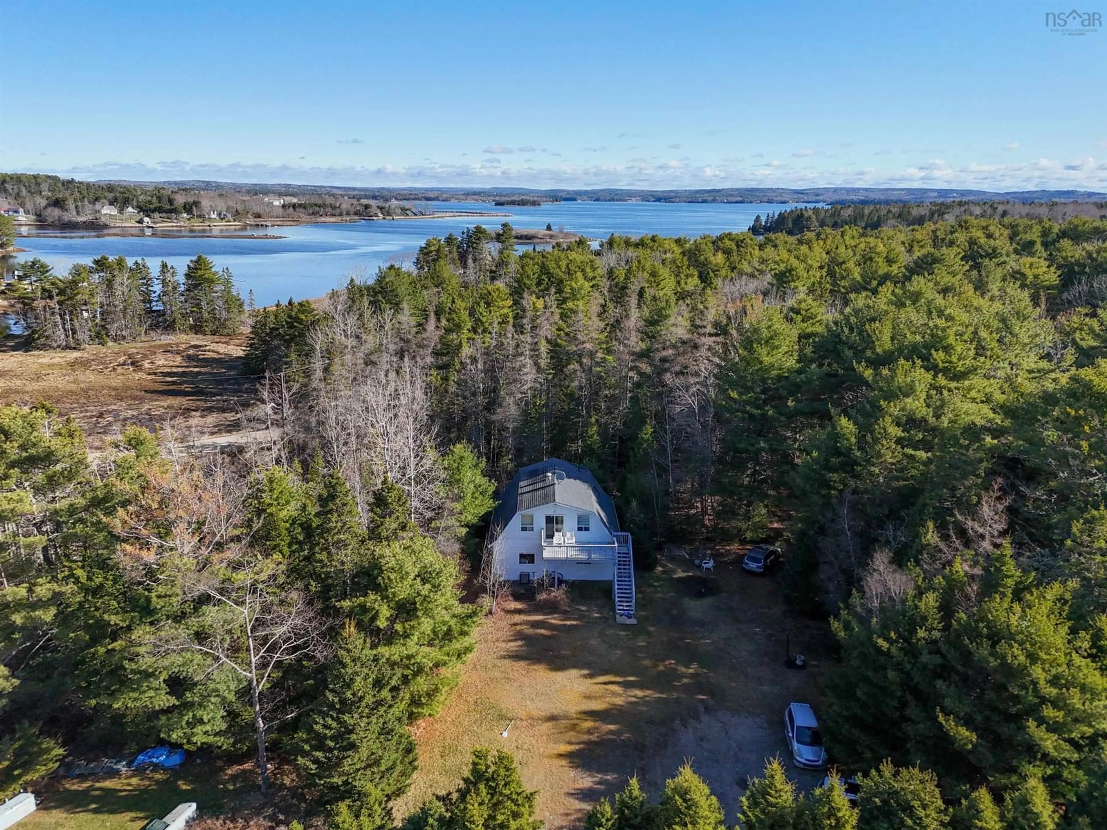 A pic from outside/outdoor area/front of a property/back of a property/a pic from drone, water/lake/river/ocean view for 15 Murry Rd, Martins Point Nova Scotia B0J 2E0