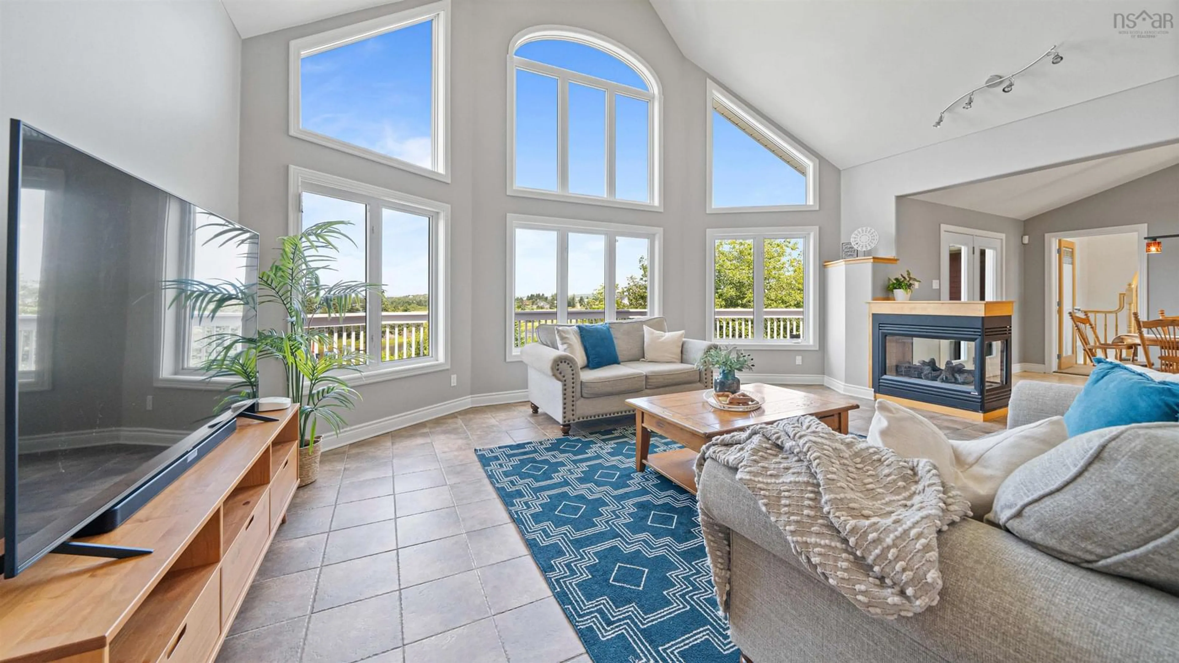 Living room with furniture, ceramic/tile floor for 390 Sambro Creek Rd, Sambro Creek Nova Scotia B3V 1L8
