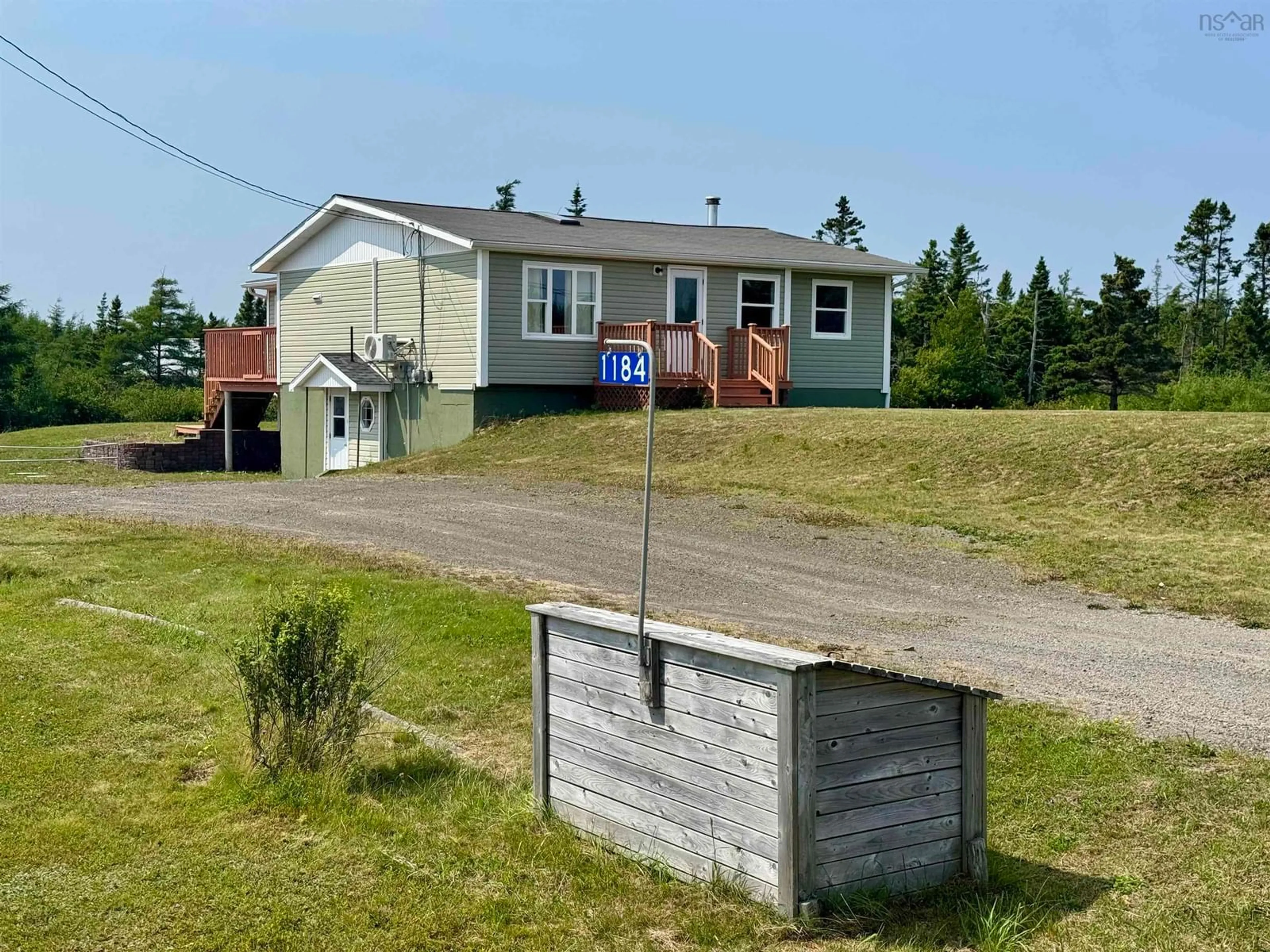 A pic from outside/outdoor area/front of a property/back of a property/a pic from drone, street for 1184 Highway 206, West Arichat Nova Scotia B0E 3J0