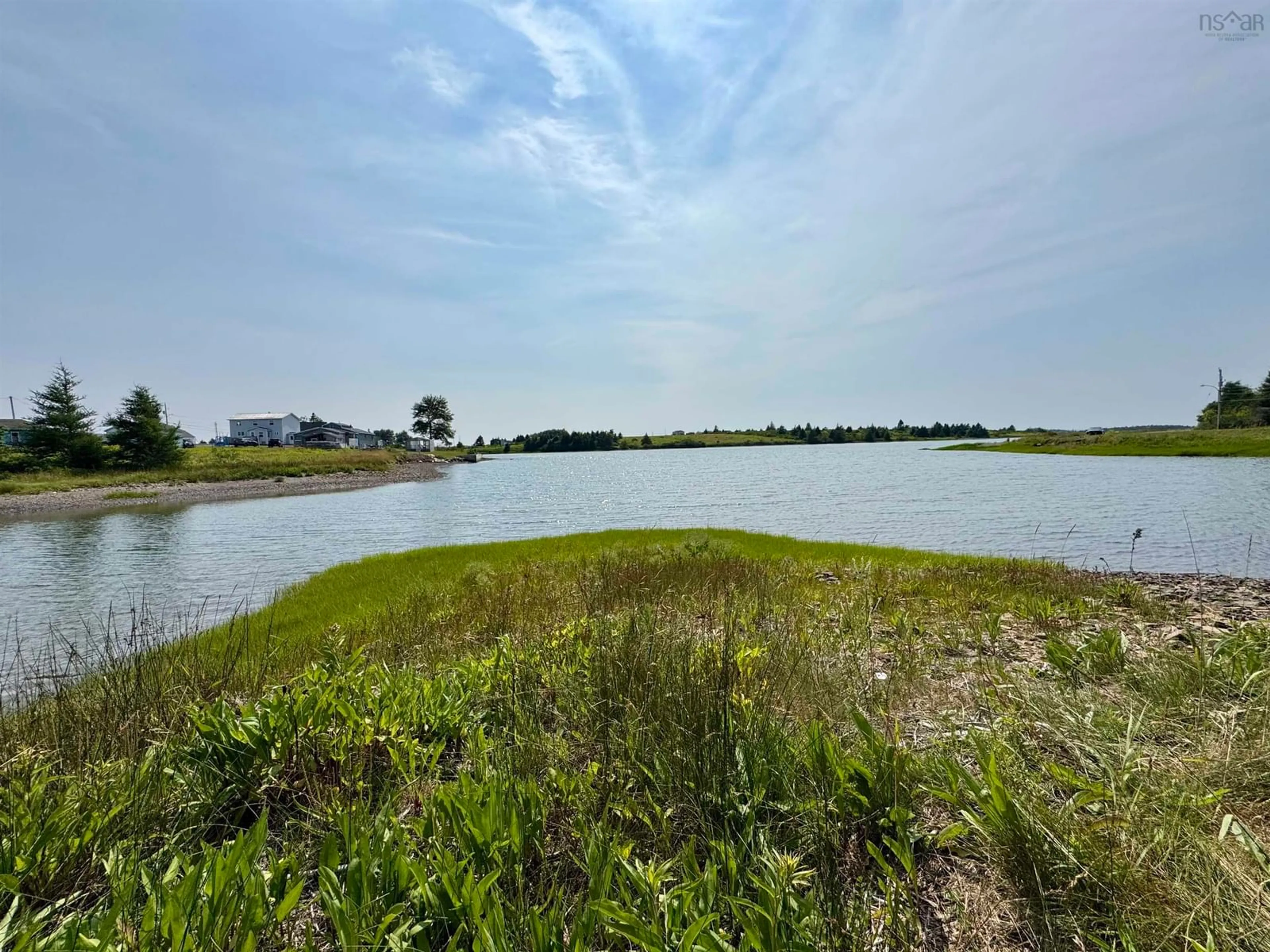 A pic from outside/outdoor area/front of a property/back of a property/a pic from drone, water/lake/river/ocean view for 1184 Highway 206, West Arichat Nova Scotia B0E 3J0