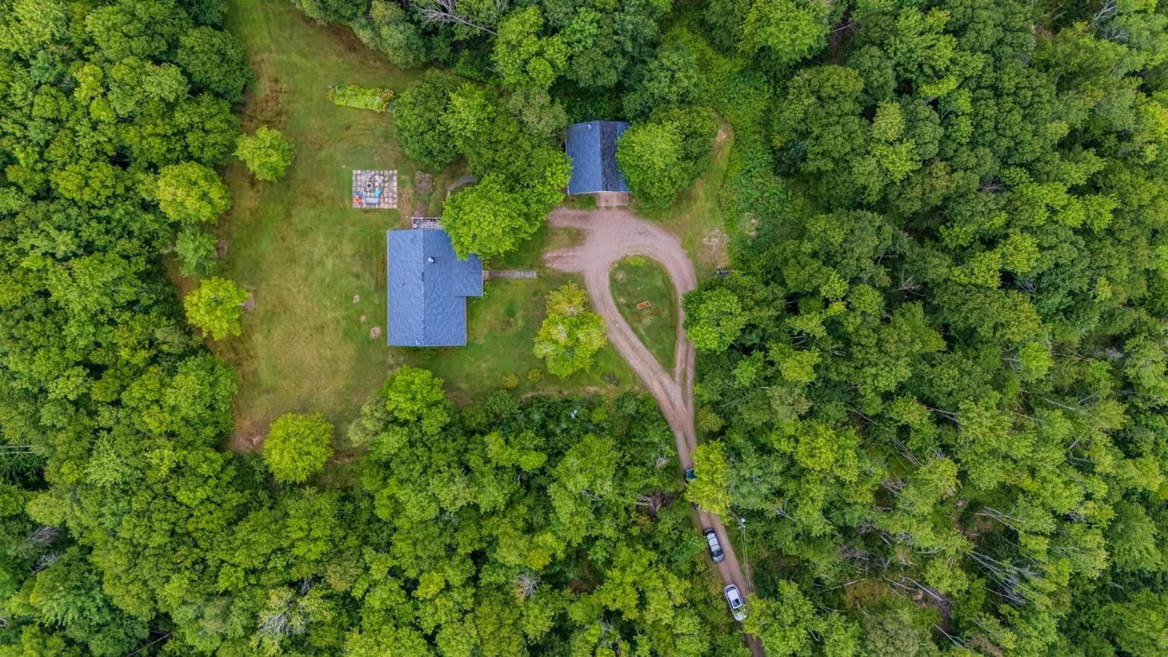 A pic from outside/outdoor area/front of a property/back of a property/a pic from drone, forest/trees view for 56 Hiram Lynds Rd, North River Nova Scotia B6L 6K2