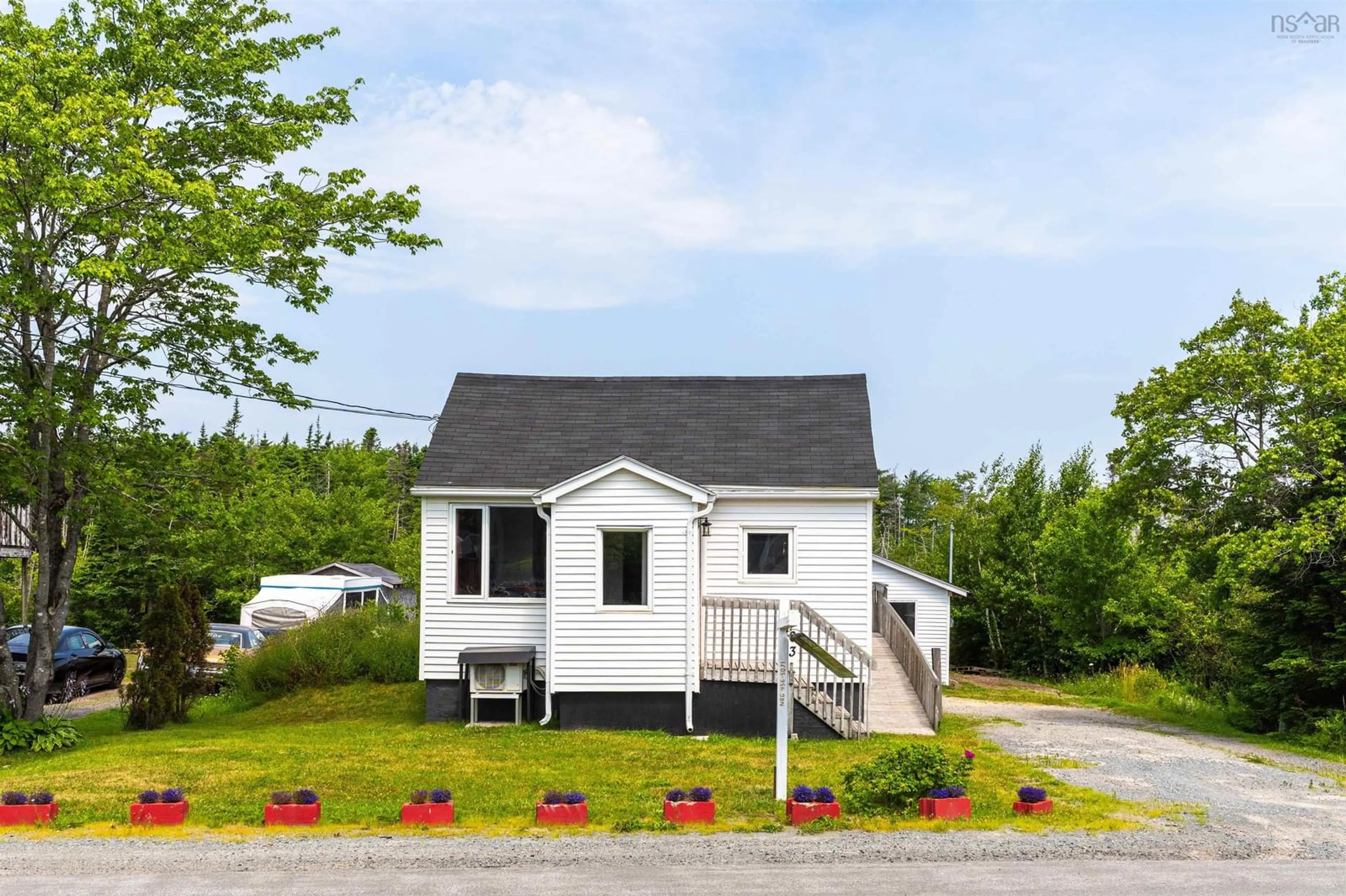 Home with vinyl exterior material, street for 803 Prospect Rd, Goodwood Nova Scotia B3T 1P3