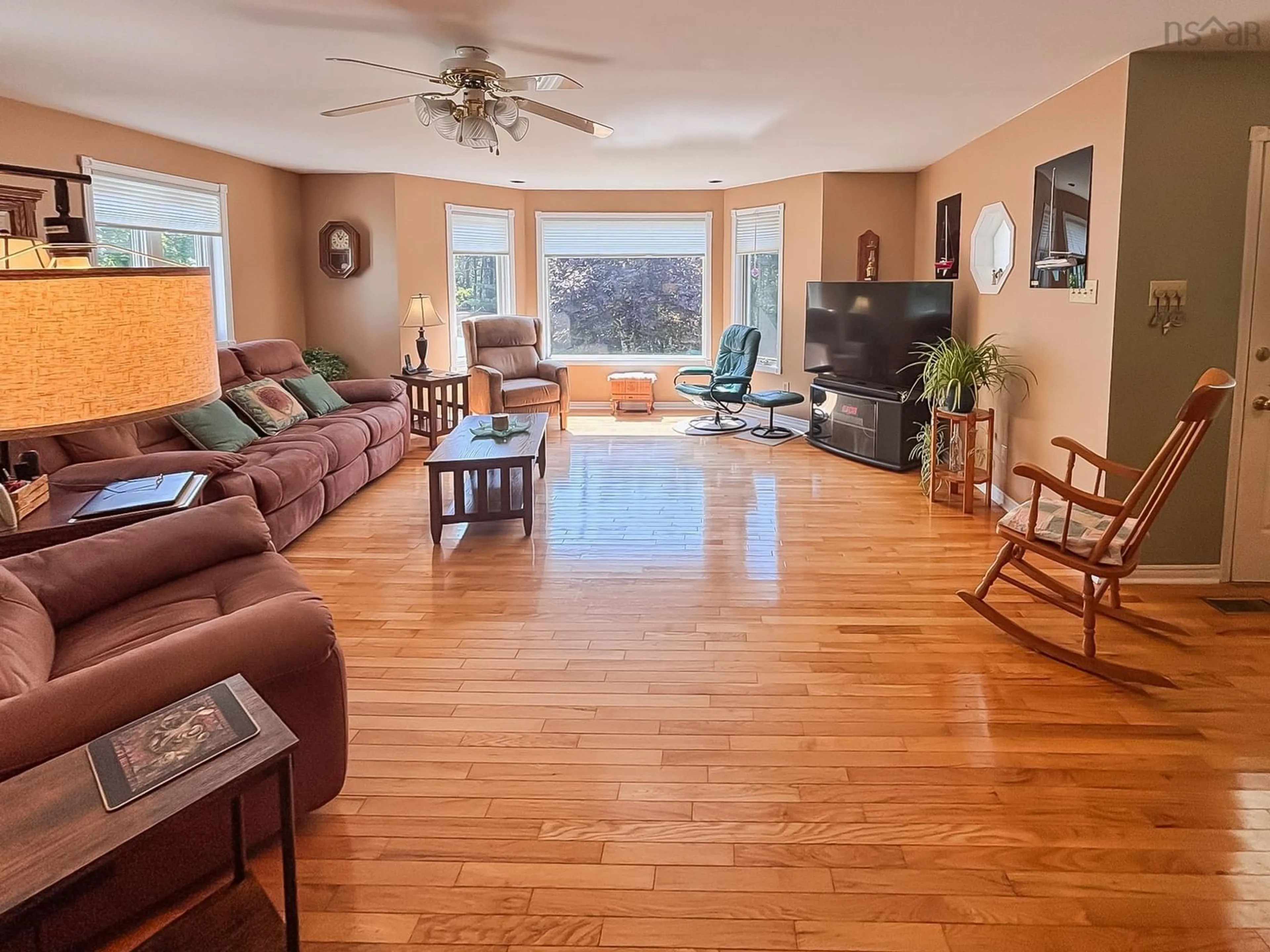 Living room with furniture, wood/laminate floor for 12970 Highway 3, Rhodes Corner Nova Scotia B4V 5N3