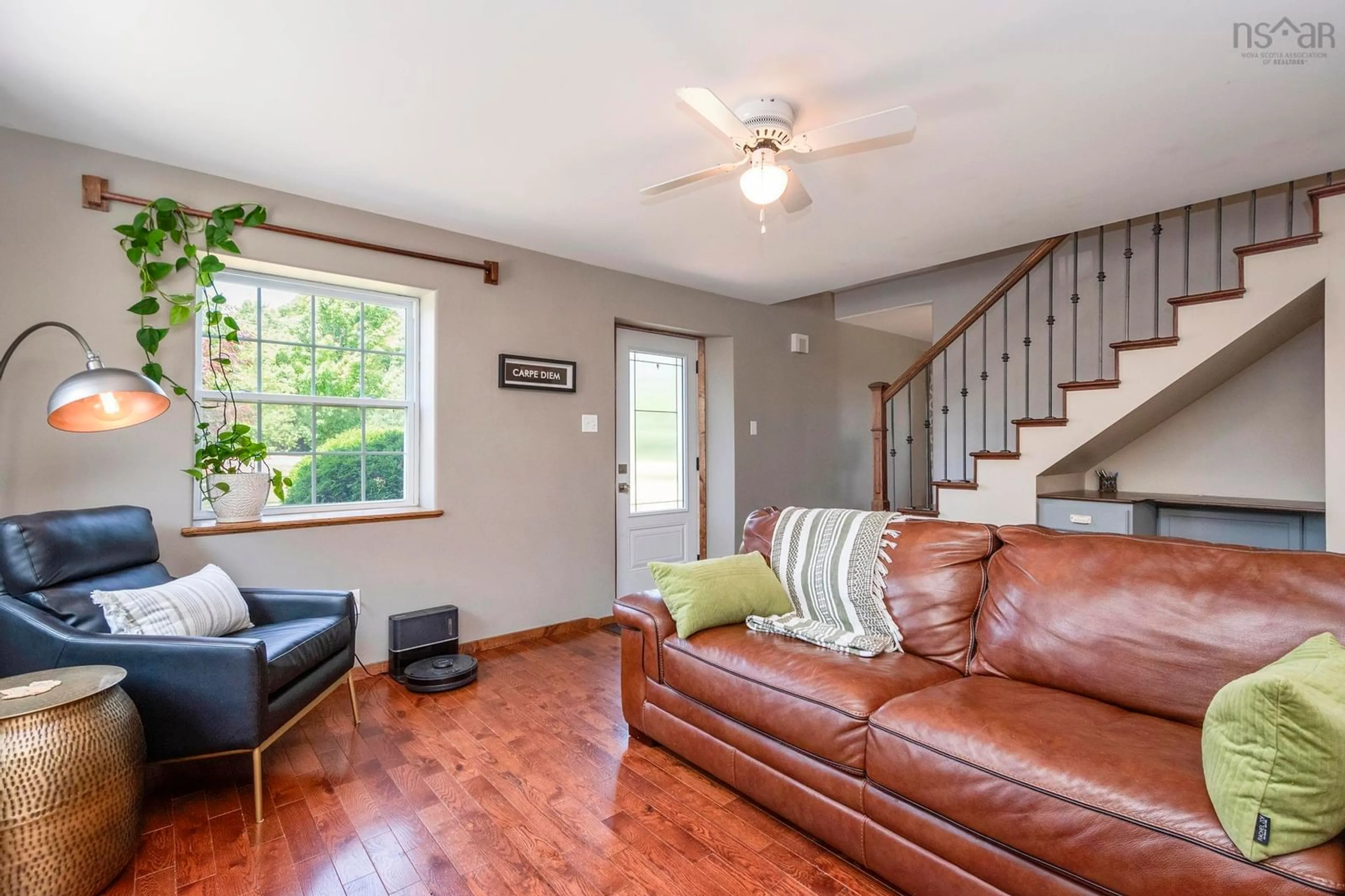 Living room with furniture, wood/laminate floor for 3010 Brooklyn St, Dempseys Corner Nova Scotia B0P 1C0