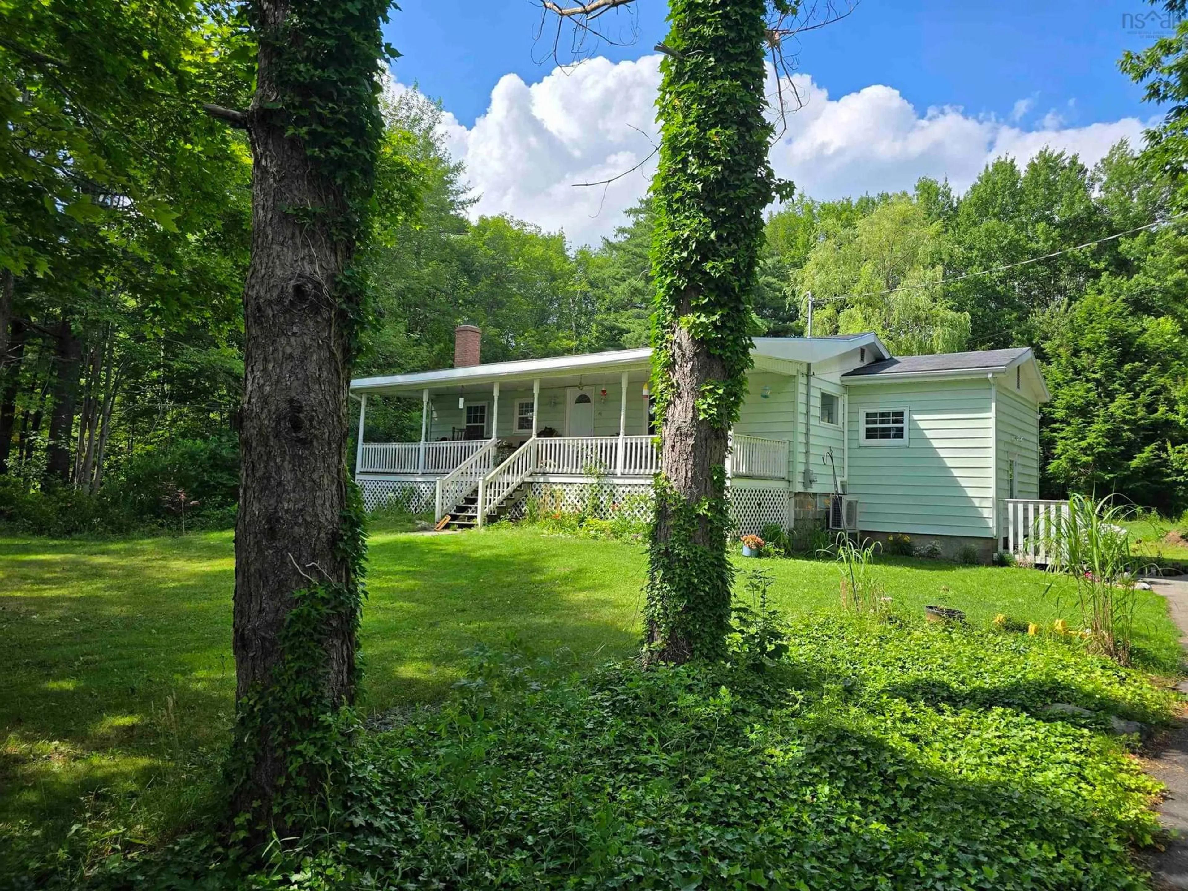 A pic from outside/outdoor area/front of a property/back of a property/a pic from drone, water/lake/river/ocean view for 19 River Rd, Milton Nova Scotia B0T 1P0