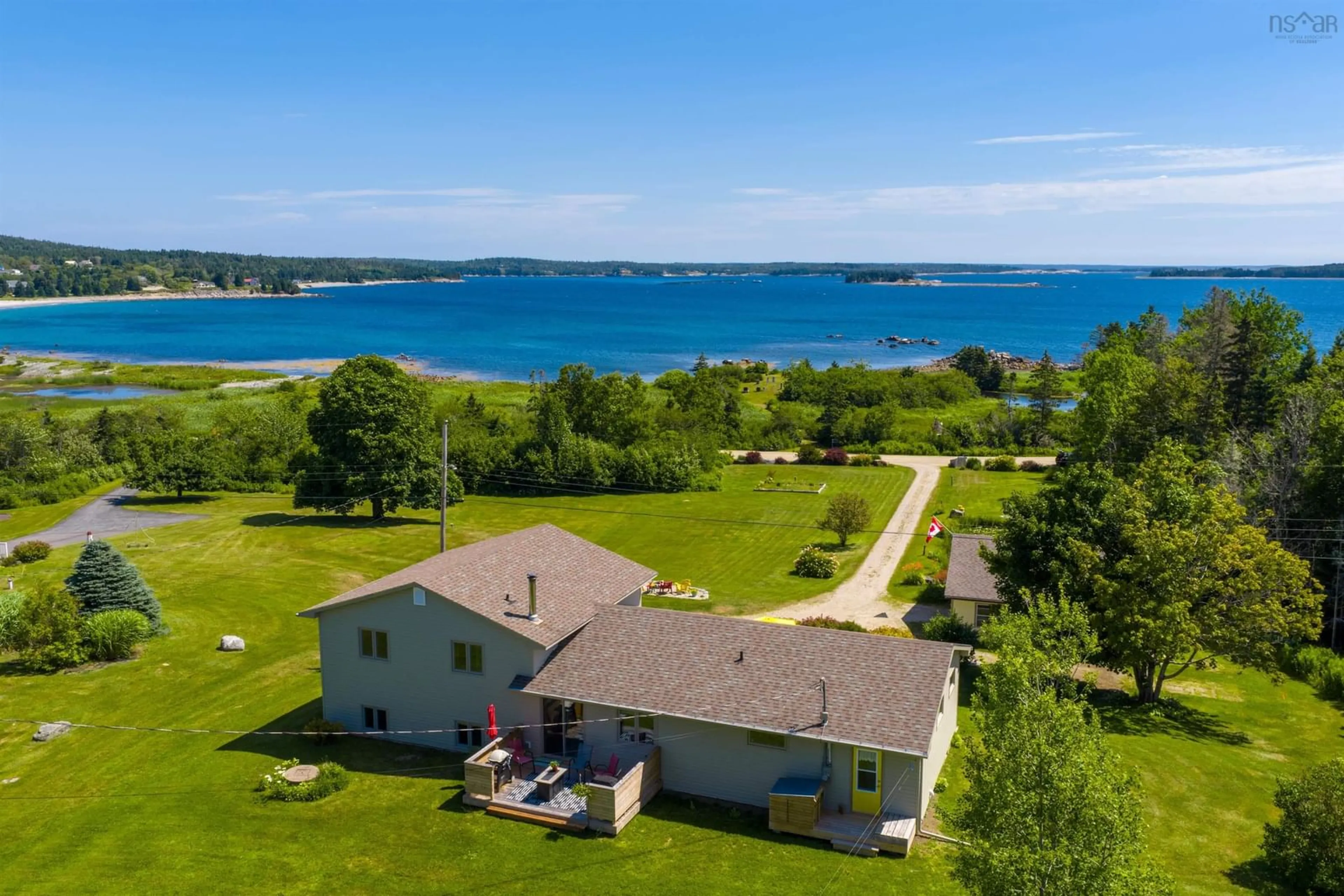 A pic from outside/outdoor area/front of a property/back of a property/a pic from drone, water/lake/river/ocean view for 48 Backman Rd, Bayswater Nova Scotia B0J 1T0
