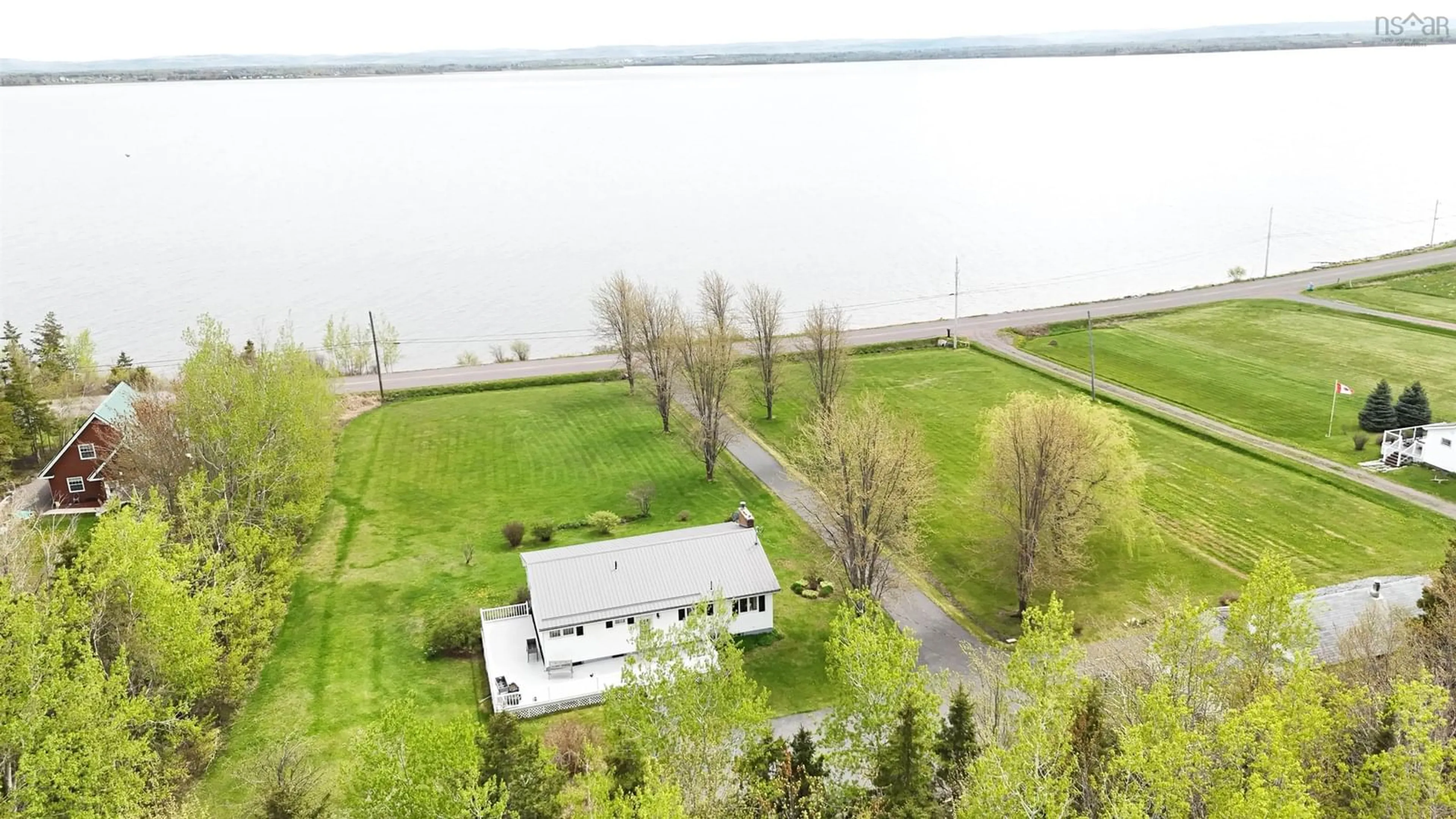 A pic from outside/outdoor area/front of a property/back of a property/a pic from drone, water/lake/river/ocean view for 3419 Malagash Rd, Malagash Centre Nova Scotia B0K 1E0