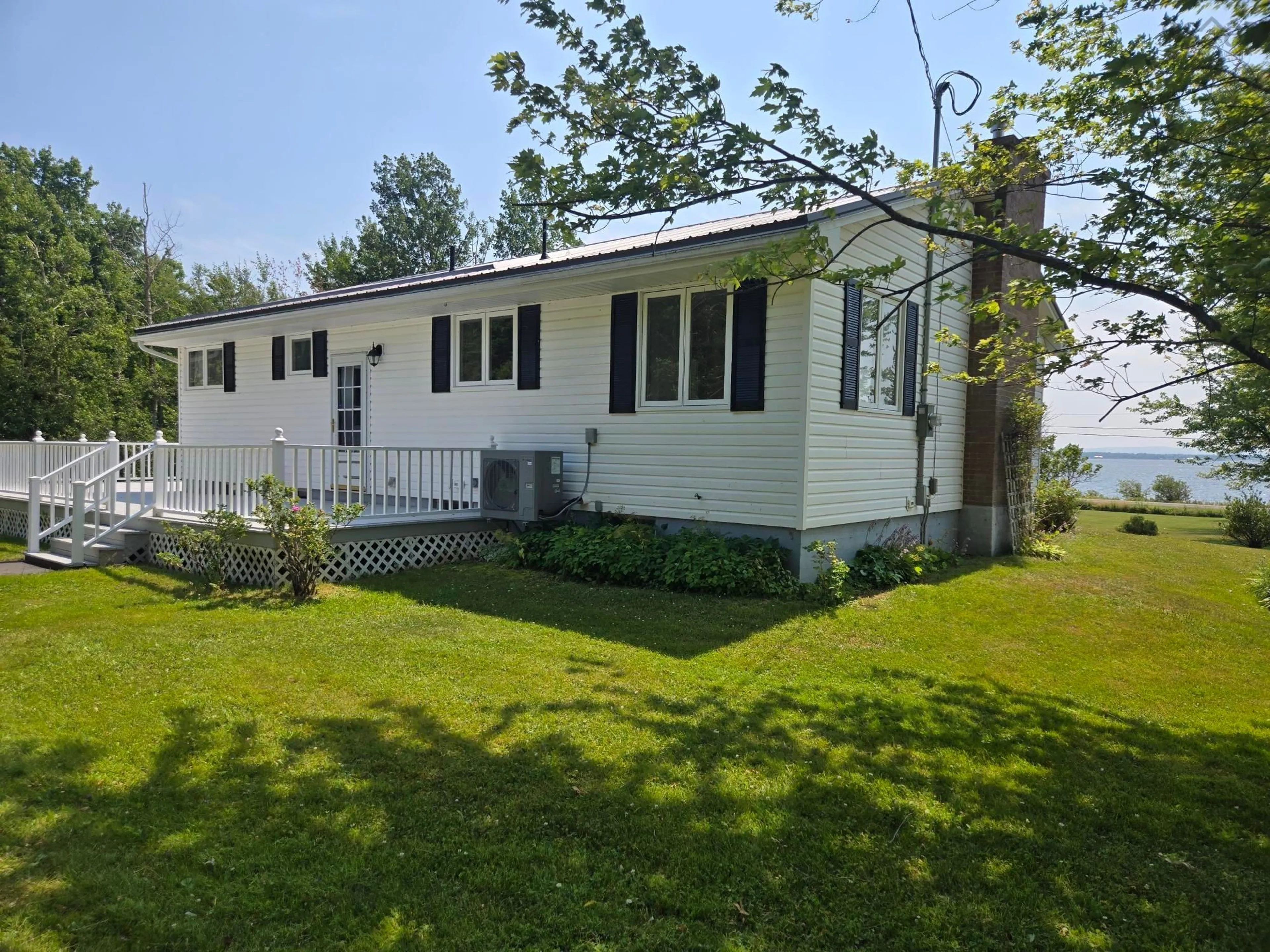 Home with vinyl exterior material, street for 3419 Malagash Rd, Malagash Centre Nova Scotia B0K 1E0