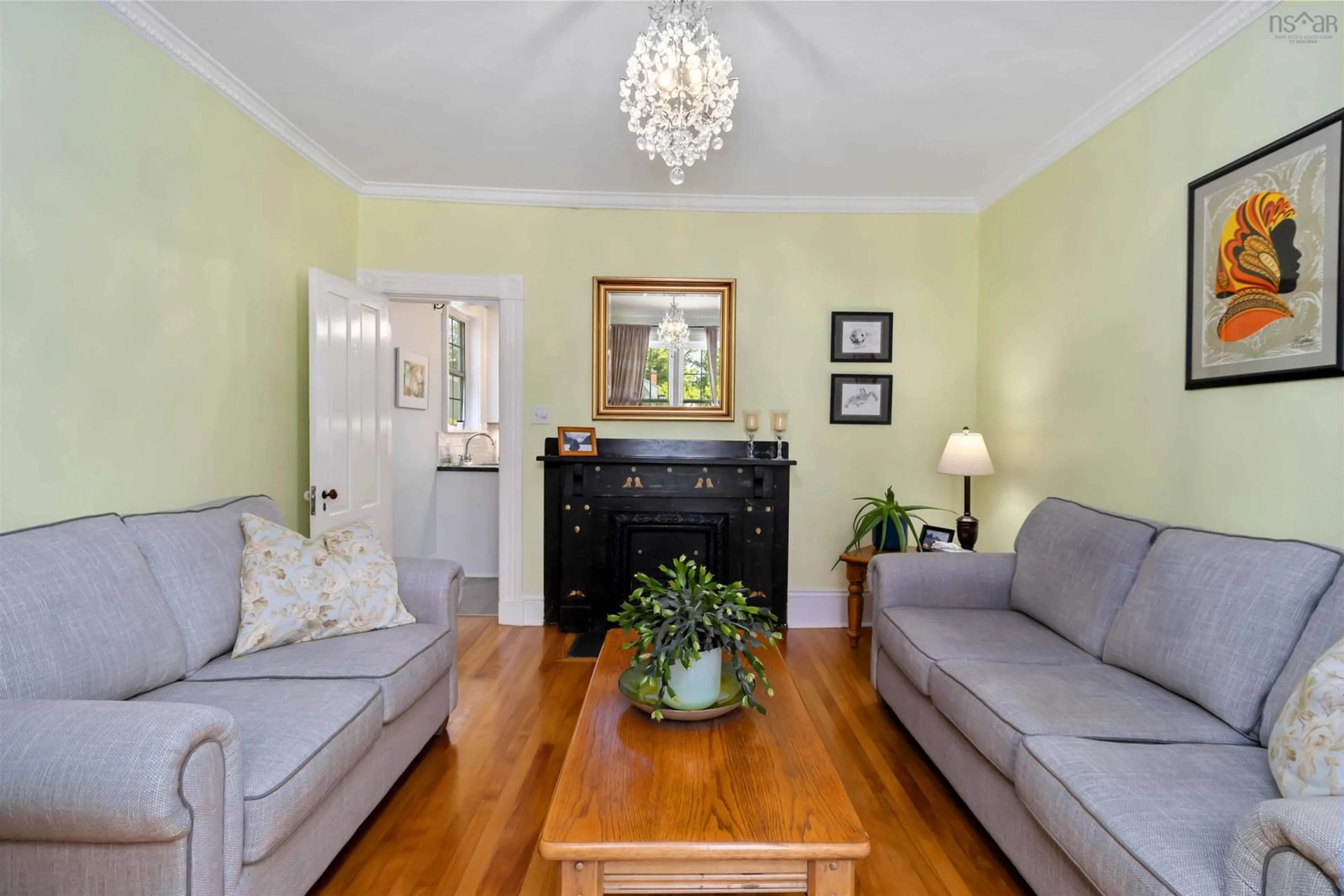 Living room with furniture, wood/laminate floor for 85 Church St, Liverpool Nova Scotia B0T 1K0