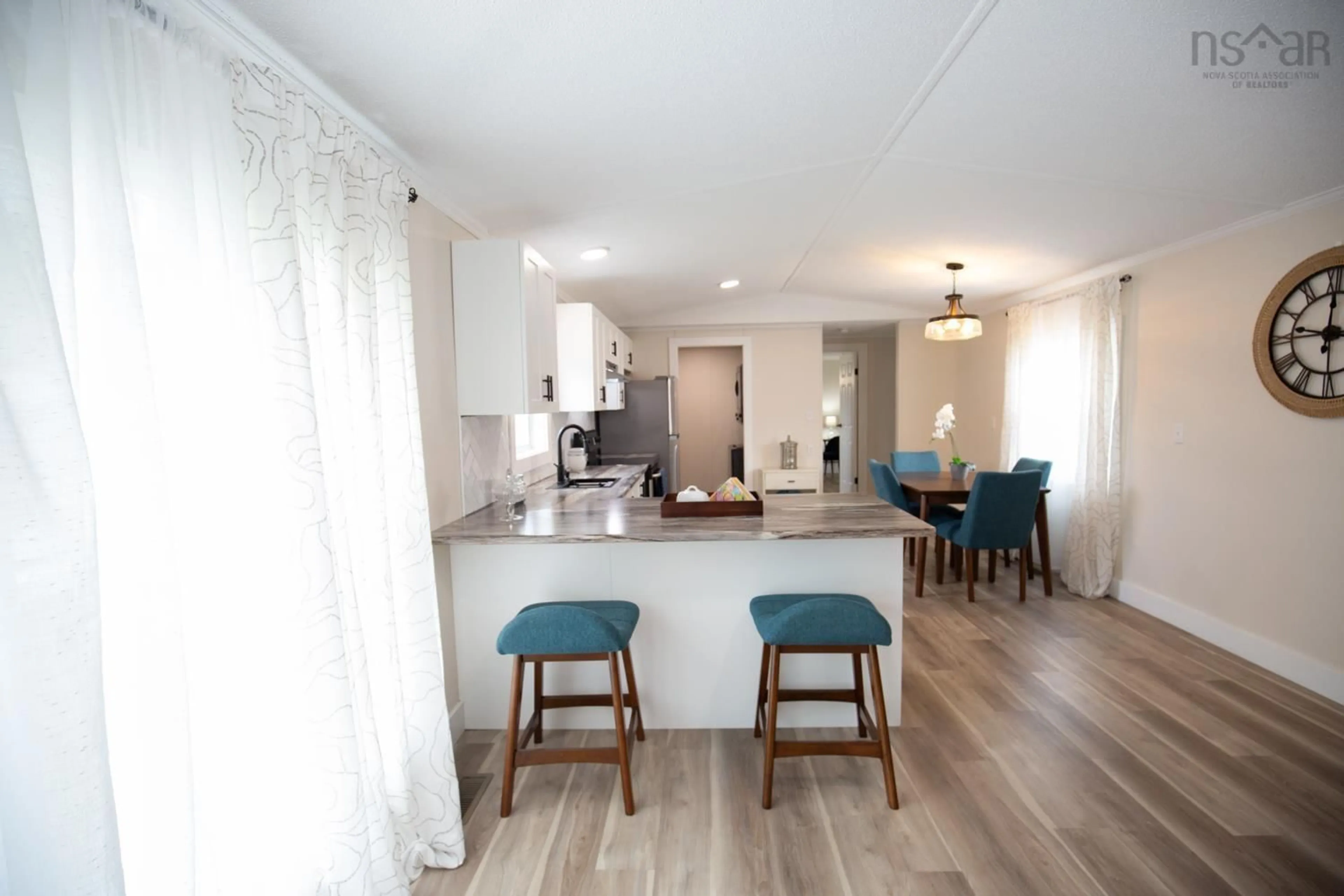 Open concept kitchen, wood/laminate floor for 11 Craig Crt, Bible Hill Nova Scotia B2N 6L5