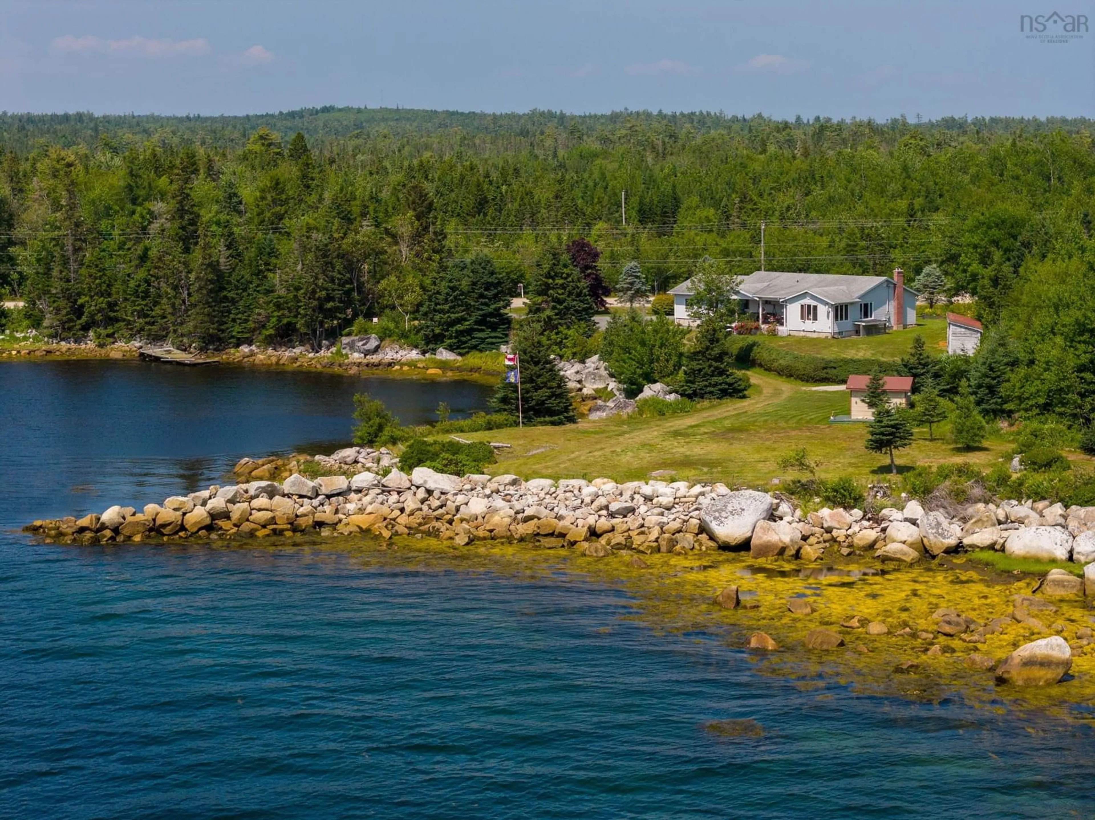 A pic from outside/outdoor area/front of a property/back of a property/a pic from drone, water/lake/river/ocean view for 7239 Highway 329, East River Point Nova Scotia B0J 1T0