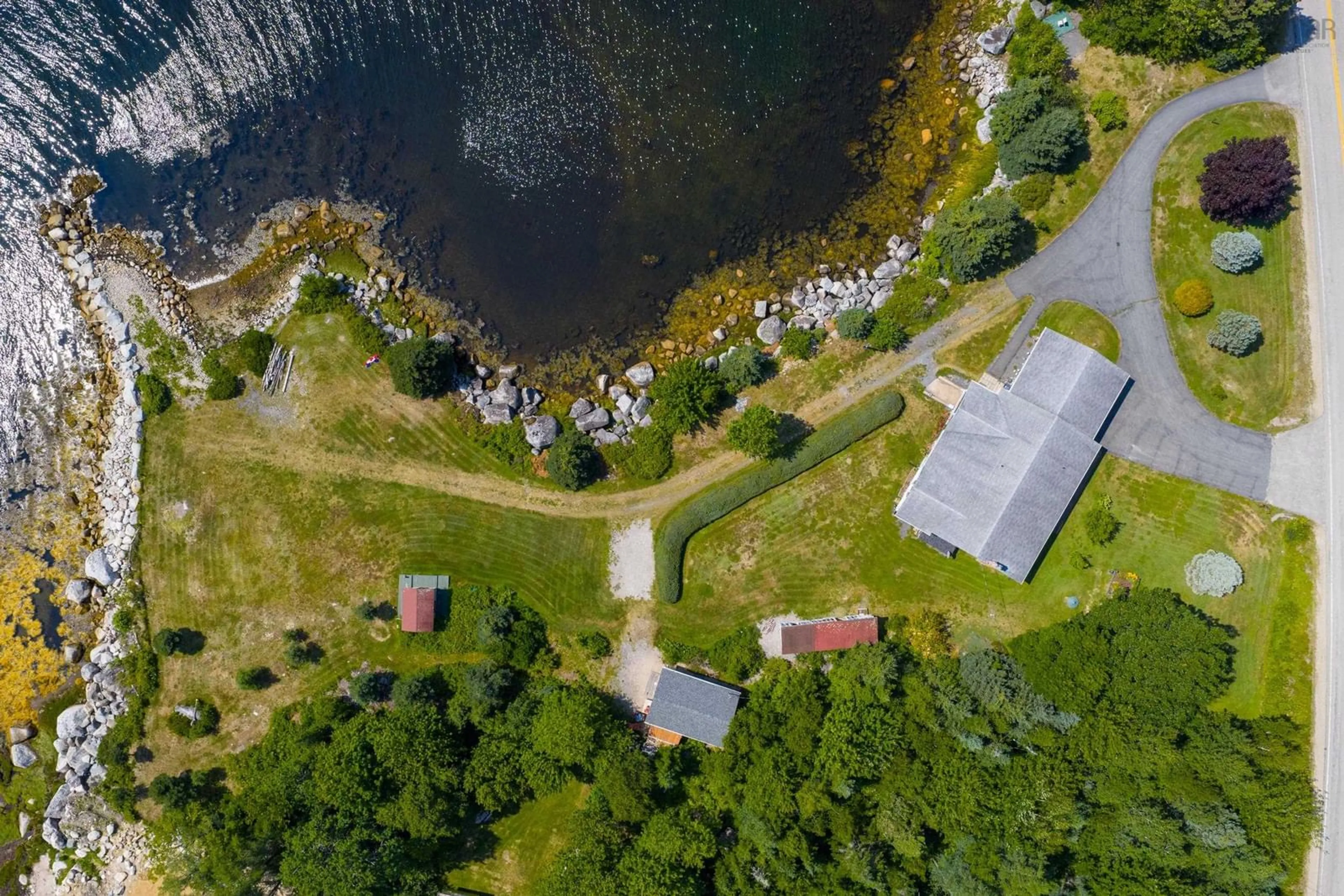 A pic from outside/outdoor area/front of a property/back of a property/a pic from drone, water/lake/river/ocean view for 7239 Highway 329, East River Point Nova Scotia B0J 1T0