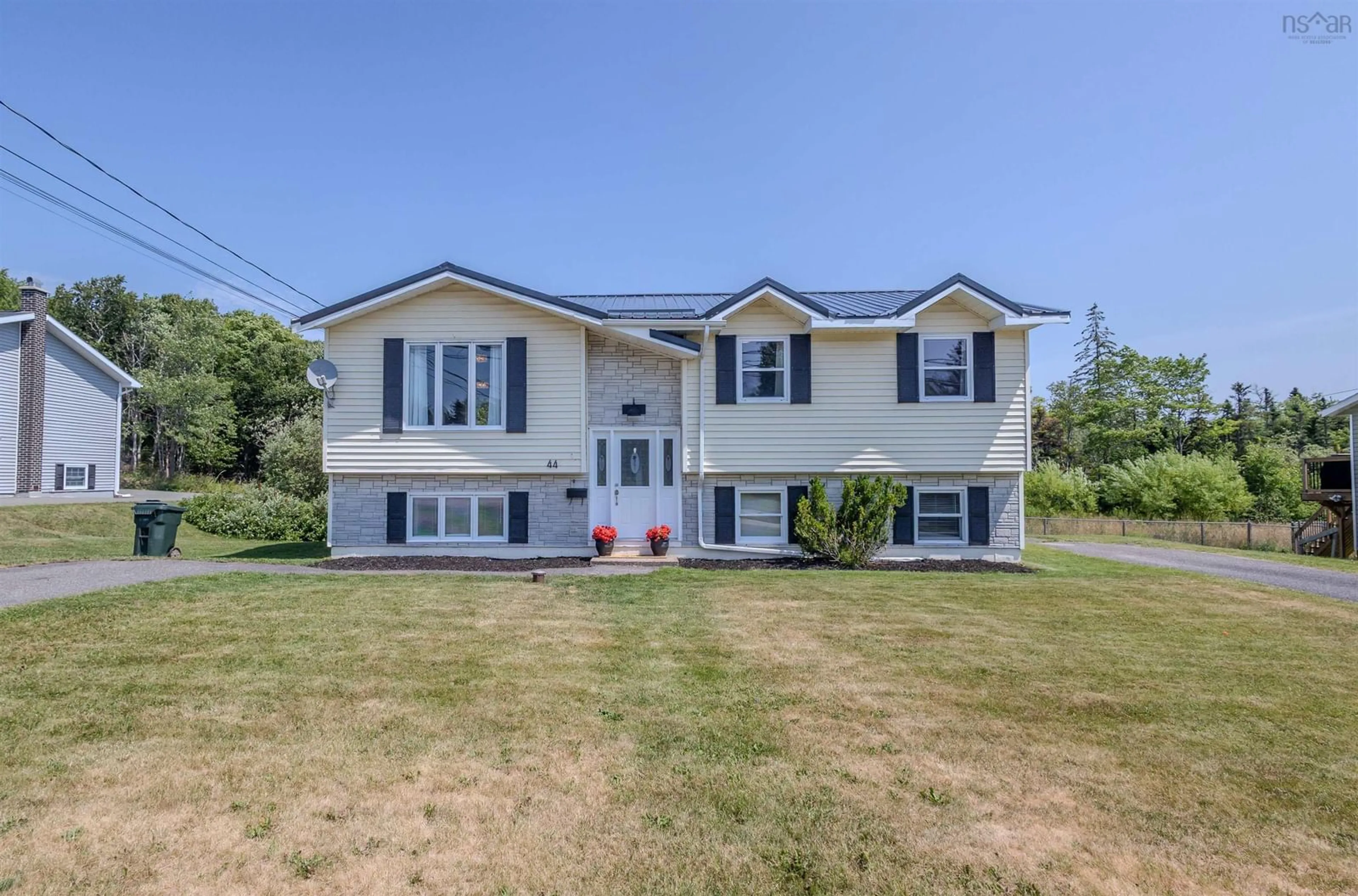 Home with vinyl exterior material, street for 42-44 Daley Dr, Coxheath Nova Scotia B1R 2J4