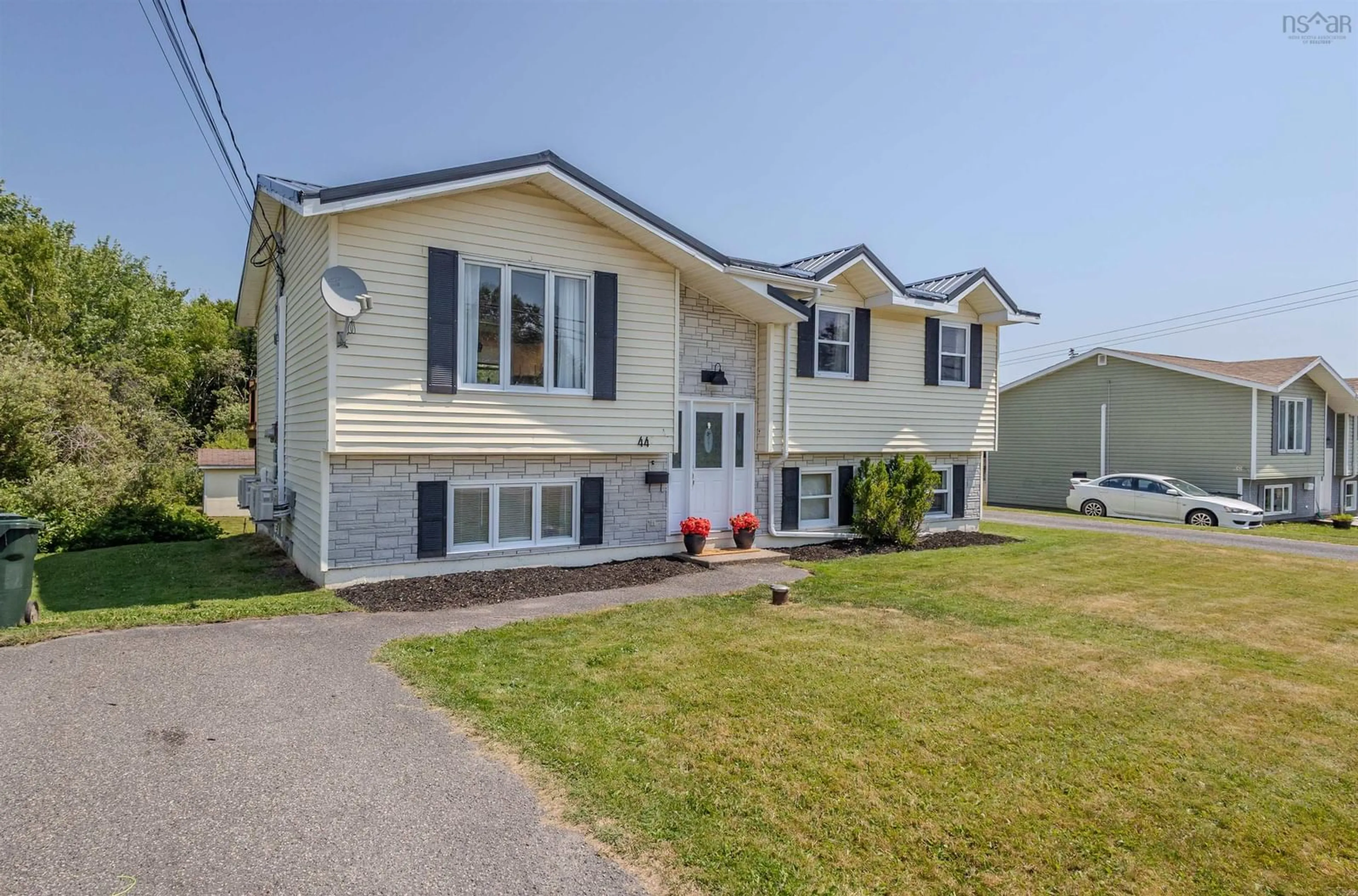 Home with vinyl exterior material, street for 42-44 Daley Dr, Coxheath Nova Scotia B1R 2J4