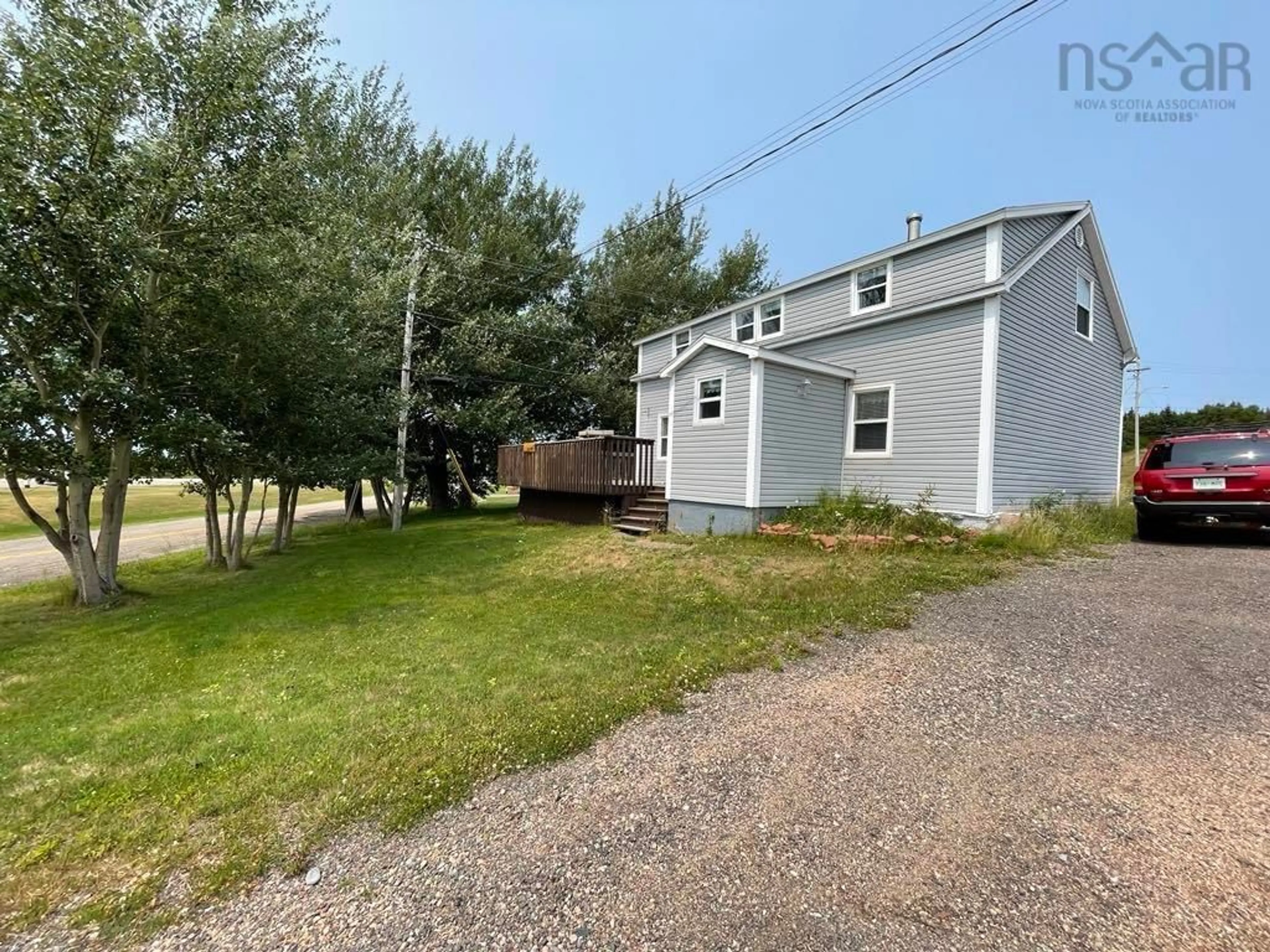 A pic from outside/outdoor area/front of a property/back of a property/a pic from drone, street for 27 Cheticamp Back Rd, Point Cross Nova Scotia B0E 1H0