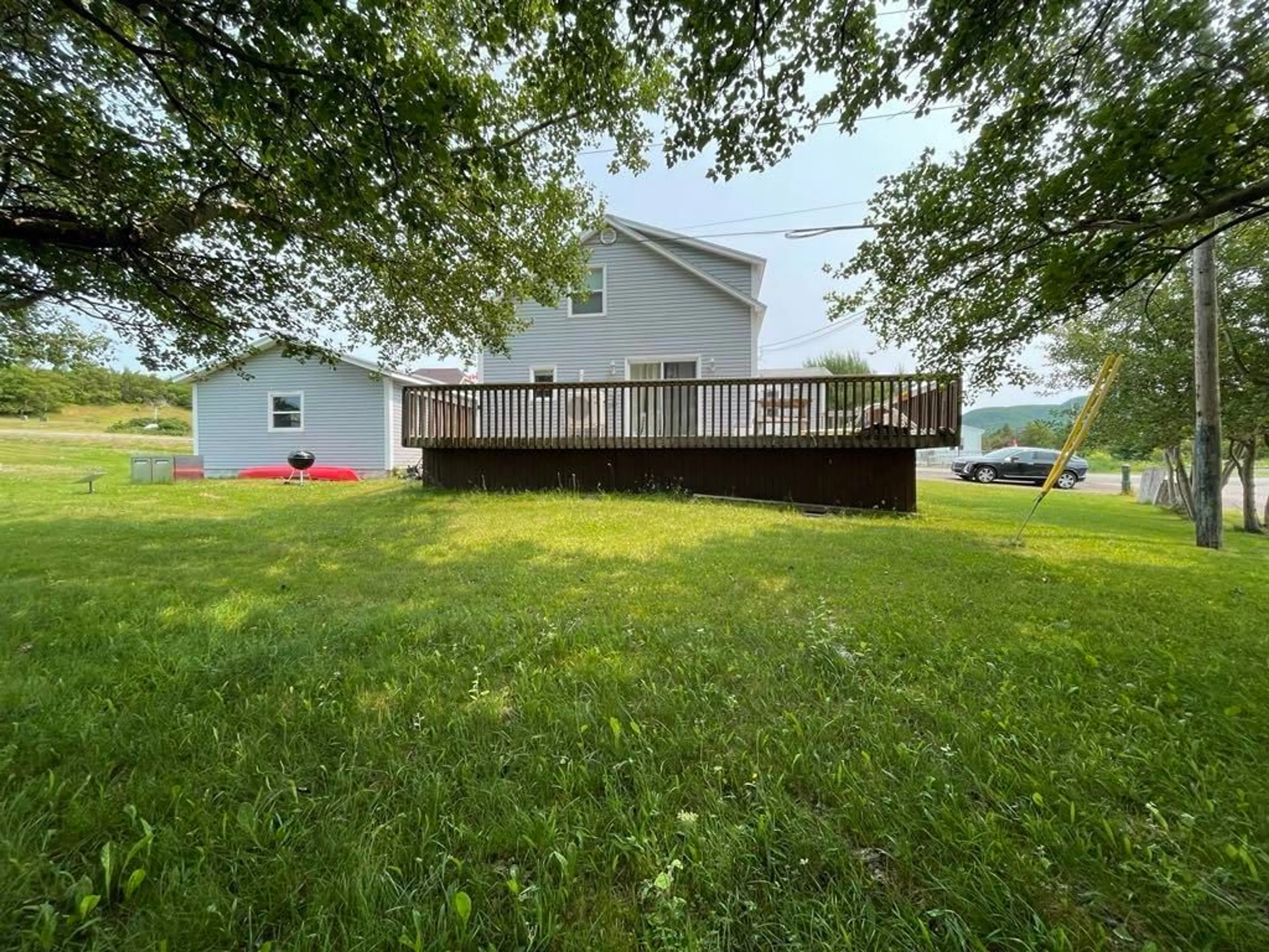 A pic from outside/outdoor area/front of a property/back of a property/a pic from drone, water/lake/river/ocean view for 27 Cheticamp Back Rd, Point Cross Nova Scotia B0E 1H0