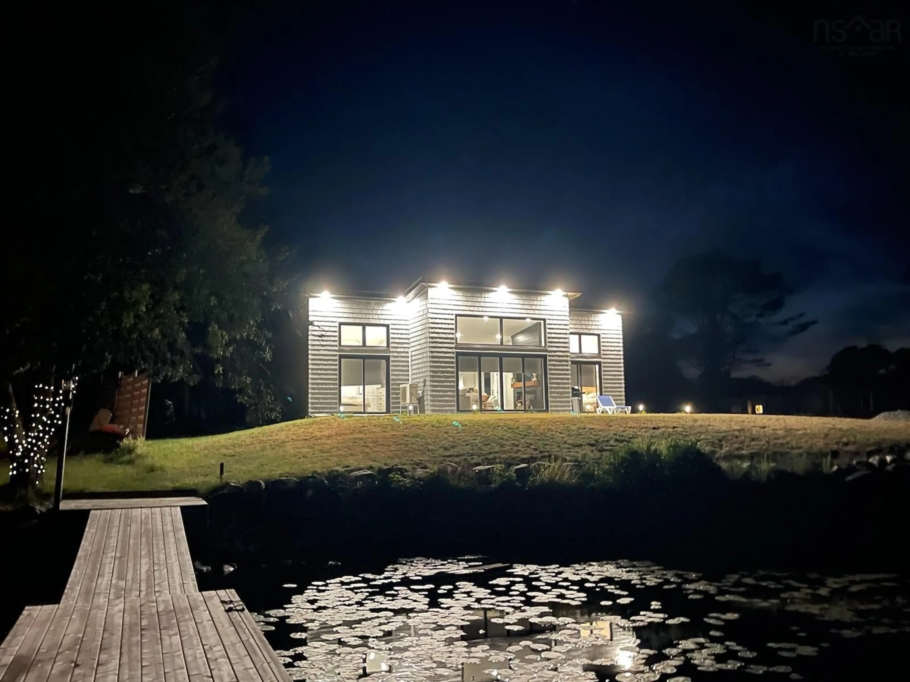 A pic from outside/outdoor area/front of a property/back of a property/a pic from drone, water/lake/river/ocean view for 87 Old Orchard Lane Beaverdam Lake ##5, Beaver Dam Nova Scotia B0T 1W0