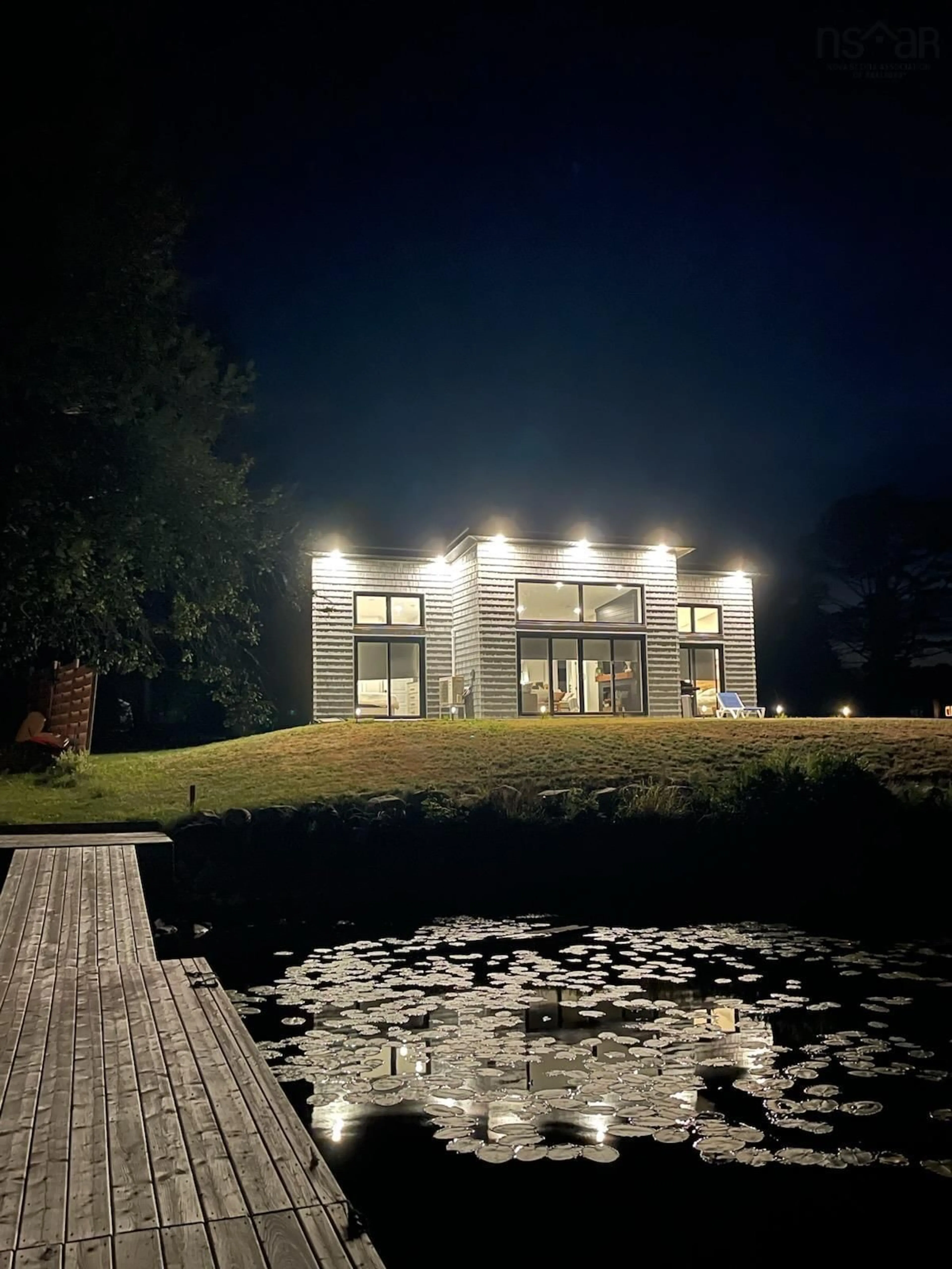 A pic from outside/outdoor area/front of a property/back of a property/a pic from drone, water/lake/river/ocean view for 87 Old Orchard Lane Beaverdam Lake ##5, Beaver Dam Nova Scotia B0T 1W0