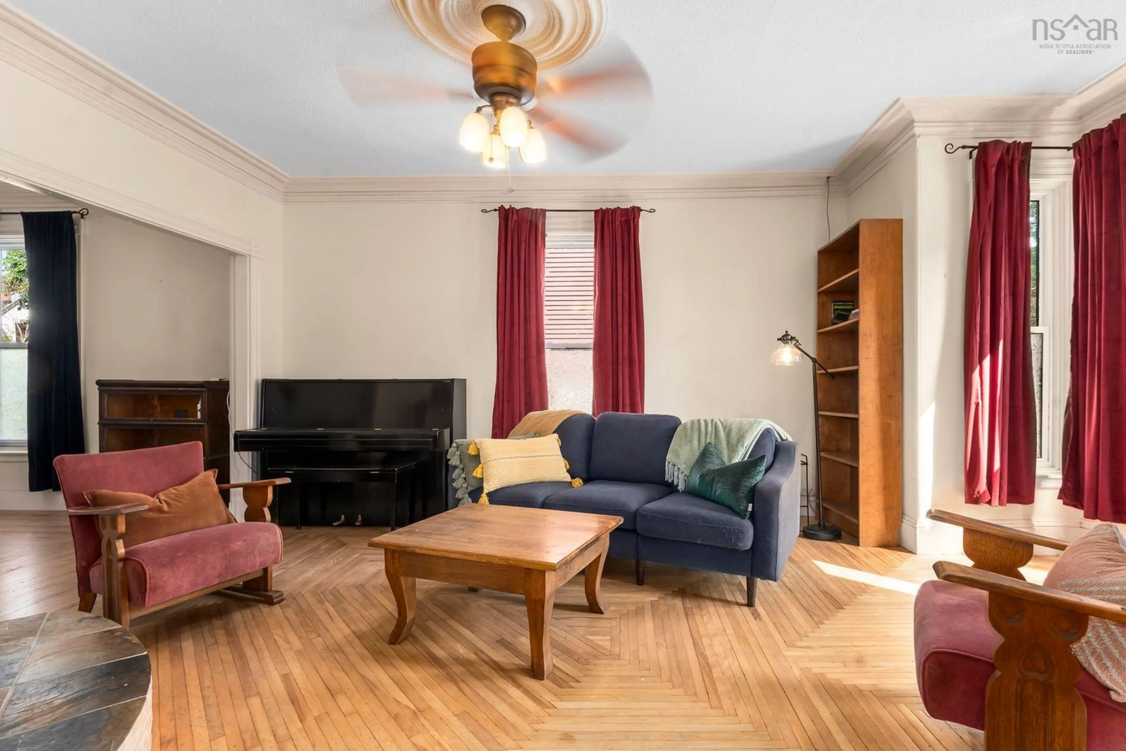 Living room with furniture, wood/laminate floor for 328 King St, Windsor Nova Scotia B0N 2T0