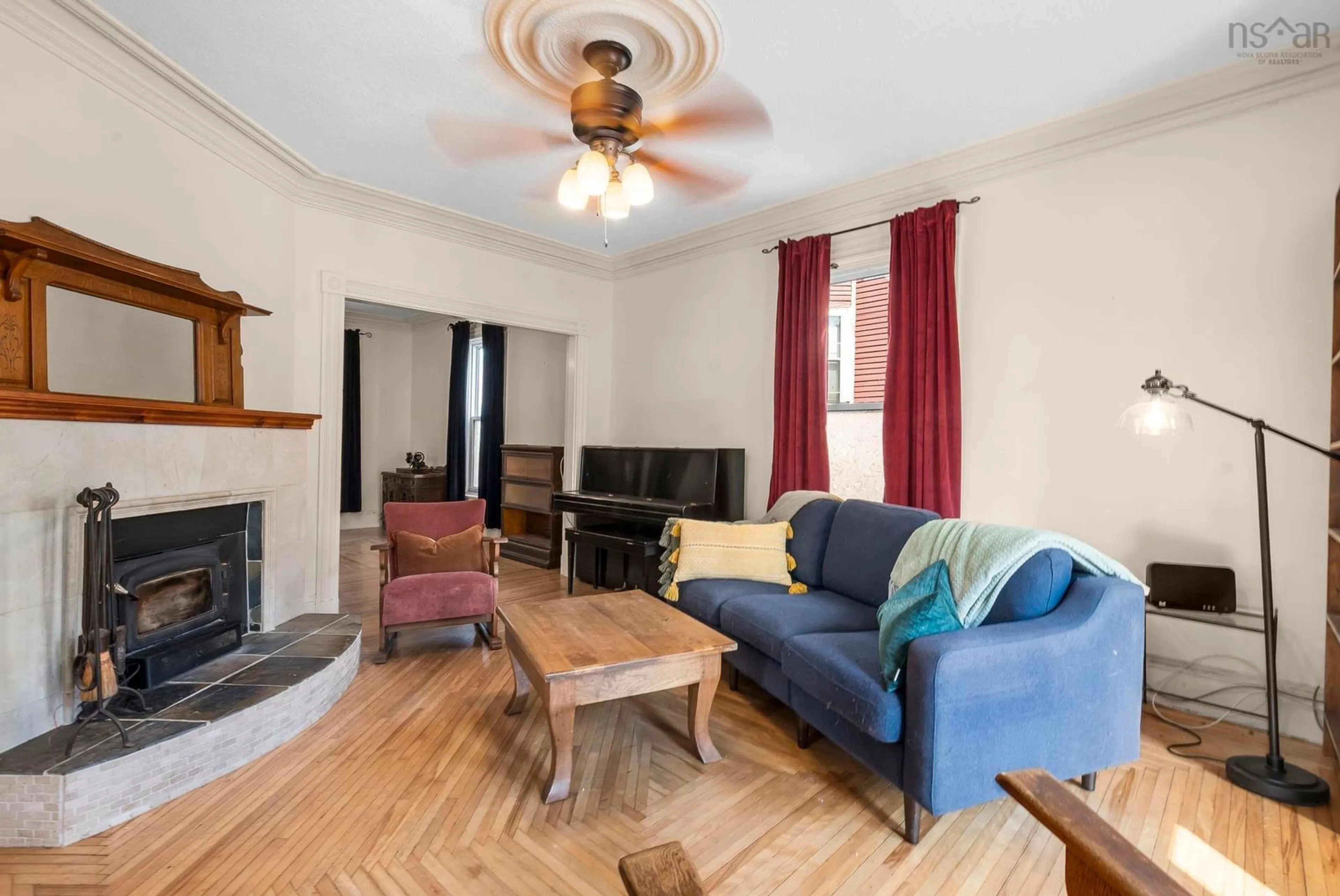 Living room with furniture, wood/laminate floor for 328 King St, Windsor Nova Scotia B0N 2T0