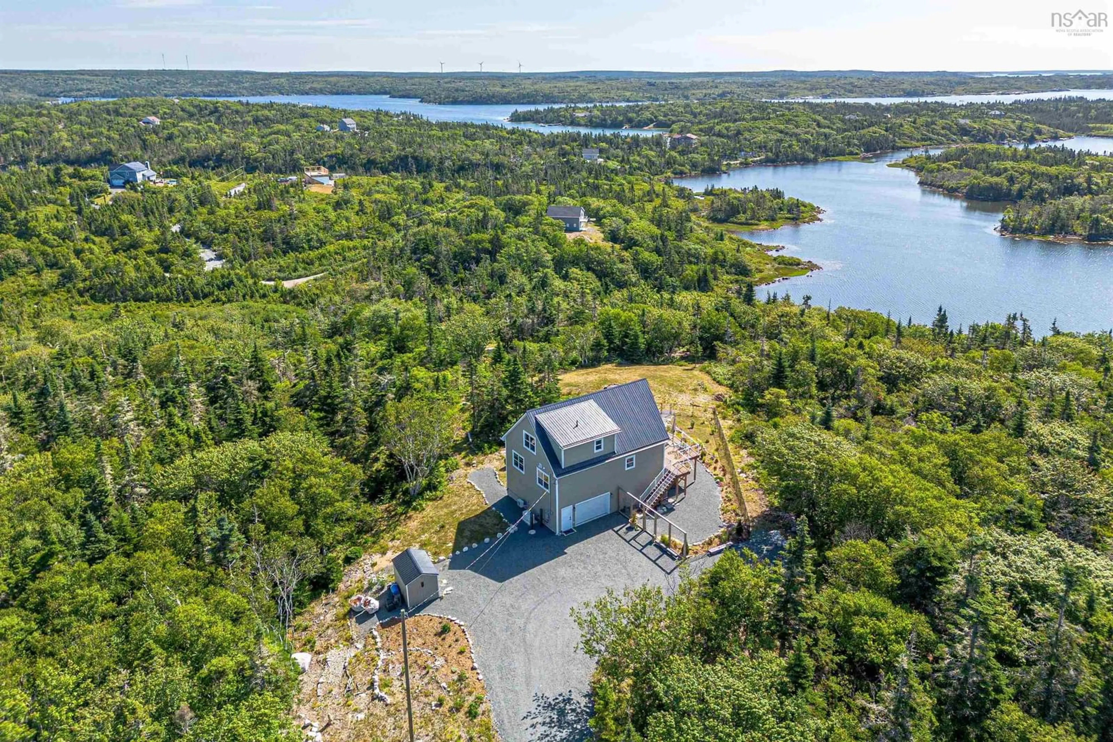 A pic from outside/outdoor area/front of a property/back of a property/a pic from drone, water/lake/river/ocean view for 1330 Prospect Bay Rd, Prospect Bay Nova Scotia B3T 2B1
