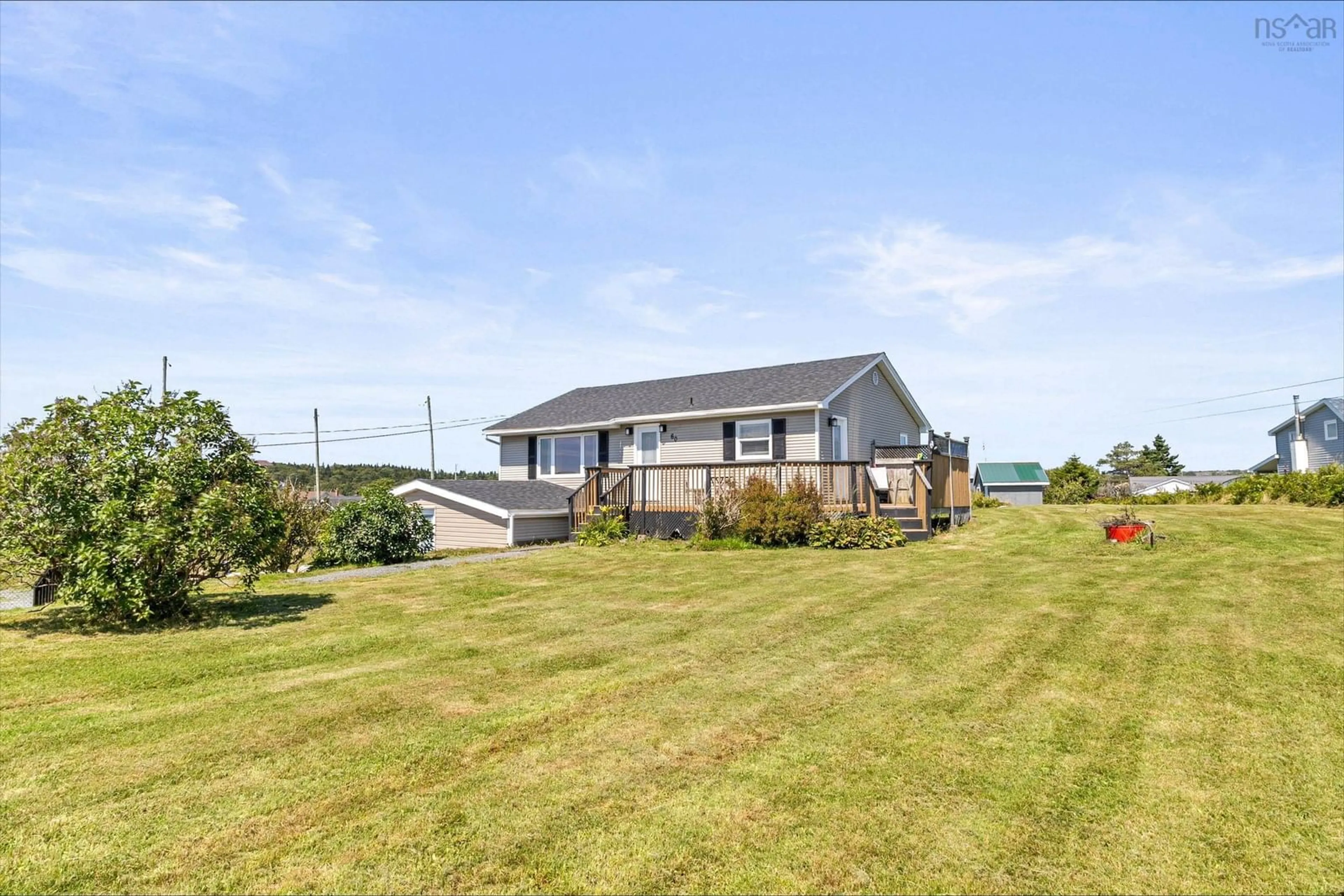 A pic from outside/outdoor area/front of a property/back of a property/a pic from drone, water/lake/river/ocean view for 60 Sandy Cove Rd, Terence Bay Nova Scotia B3T 1Y2