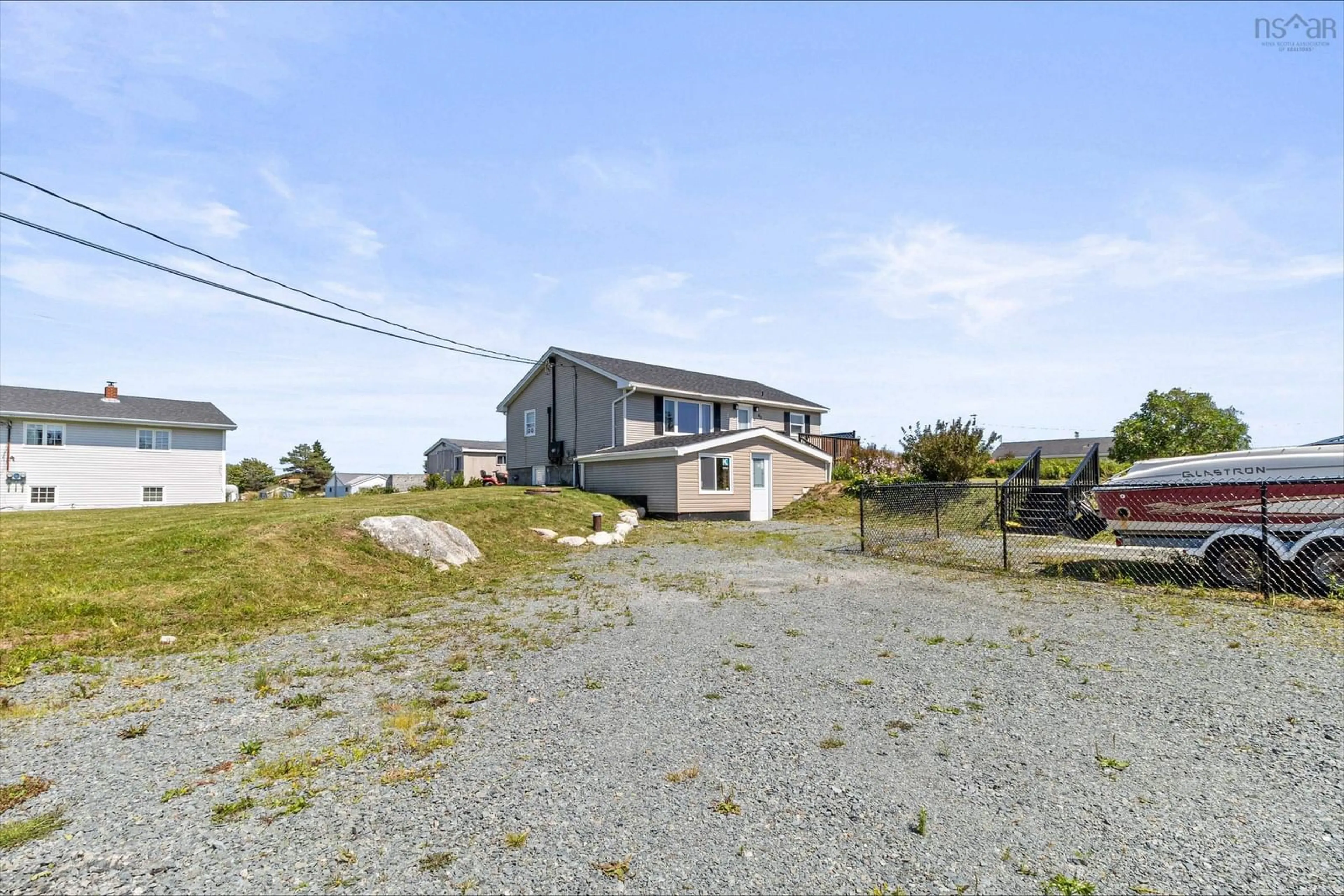 A pic from outside/outdoor area/front of a property/back of a property/a pic from drone, unknown for 60 Sandy Cove Rd, Terence Bay Nova Scotia B3T 1Y2