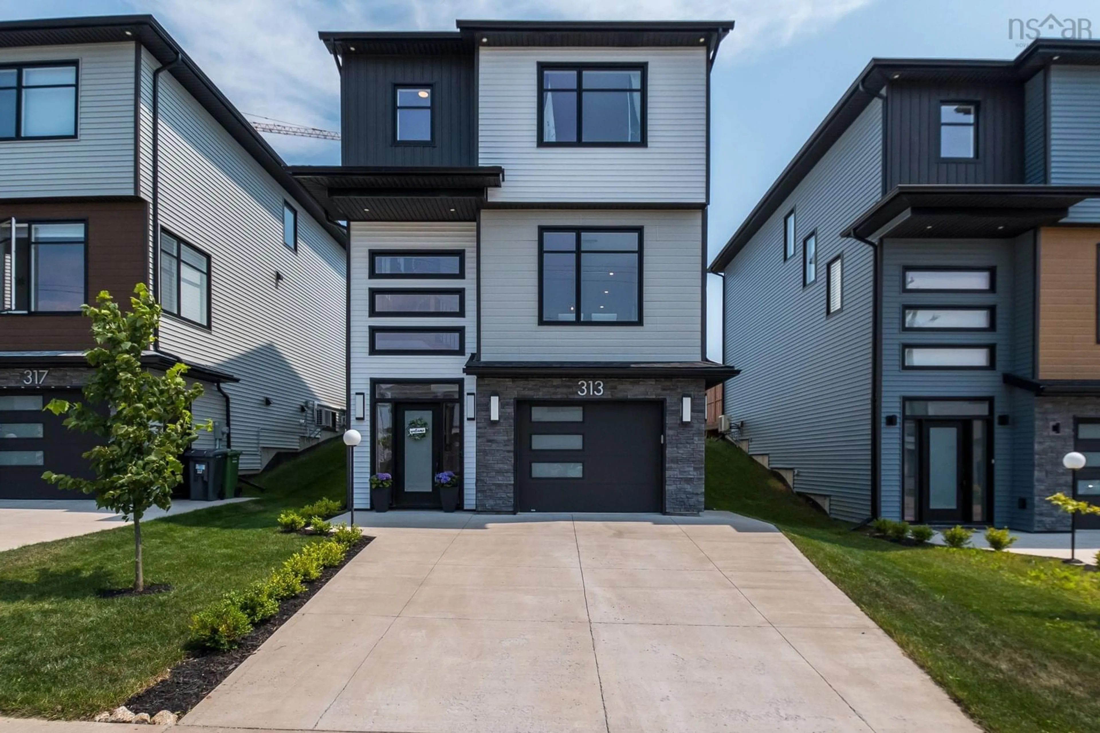 Home with brick exterior material, street for 313 Marketway Lane, Timberlea Nova Scotia B3T 1L5