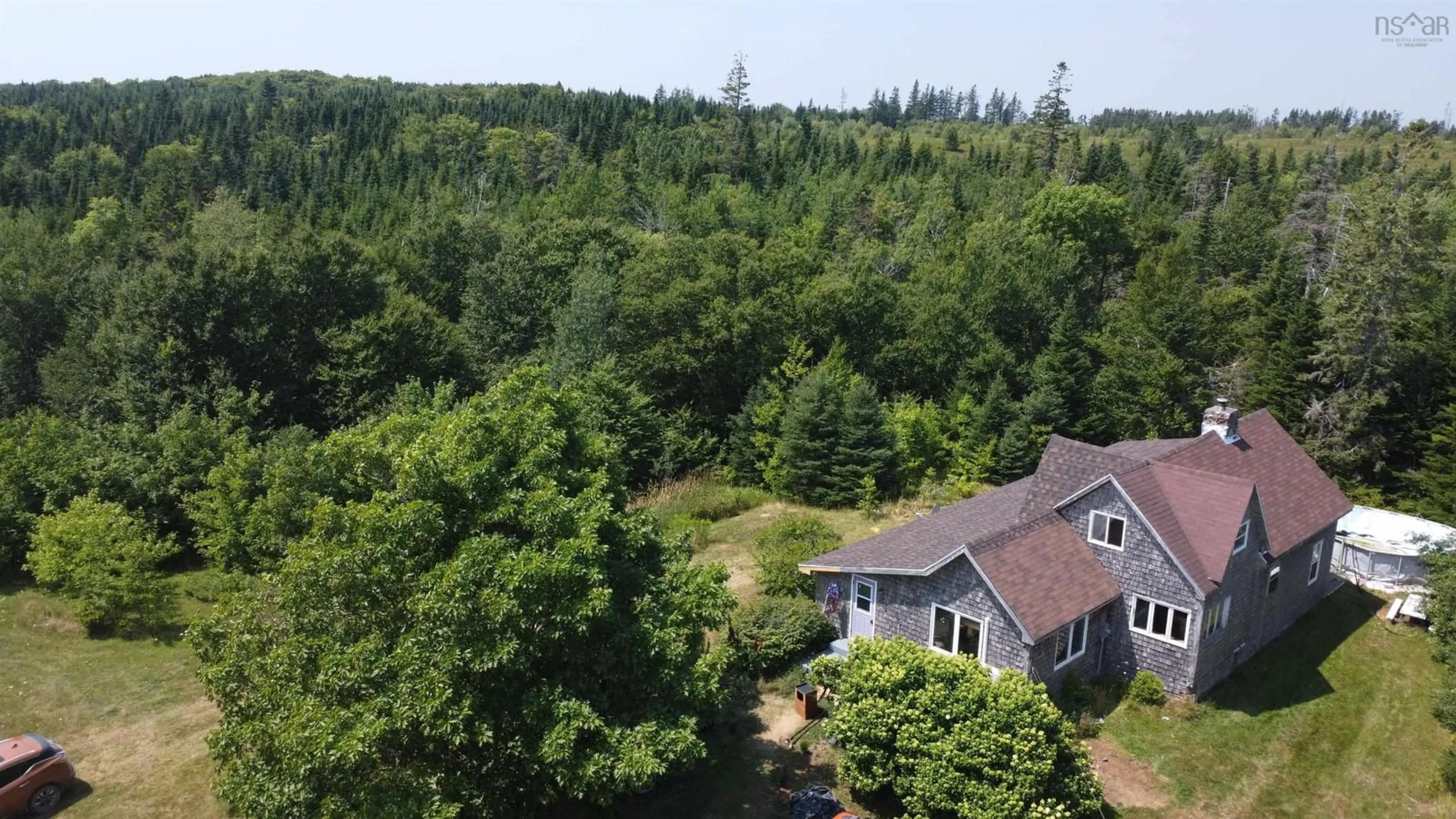A pic from outside/outdoor area/front of a property/back of a property/a pic from drone, forest/trees view for 231 Gower Rd, West River Station Nova Scotia B0K 1Z0